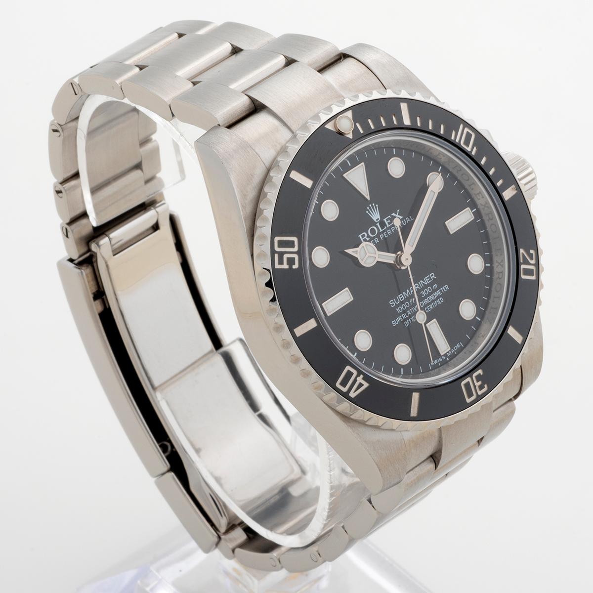 Our discontinued Rolex Submariner reference 114060 aka Submariner no date, features a 40mm stainless steel case with stainless steel Oyster bracelet. Presented in excellent condition with only light signs of use from new, our Rolex Submariner comes