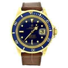 Vintage Rolex Submariner Ref. 1680 Yellow Gold Original Blue Tropical Dial Watch, 1971