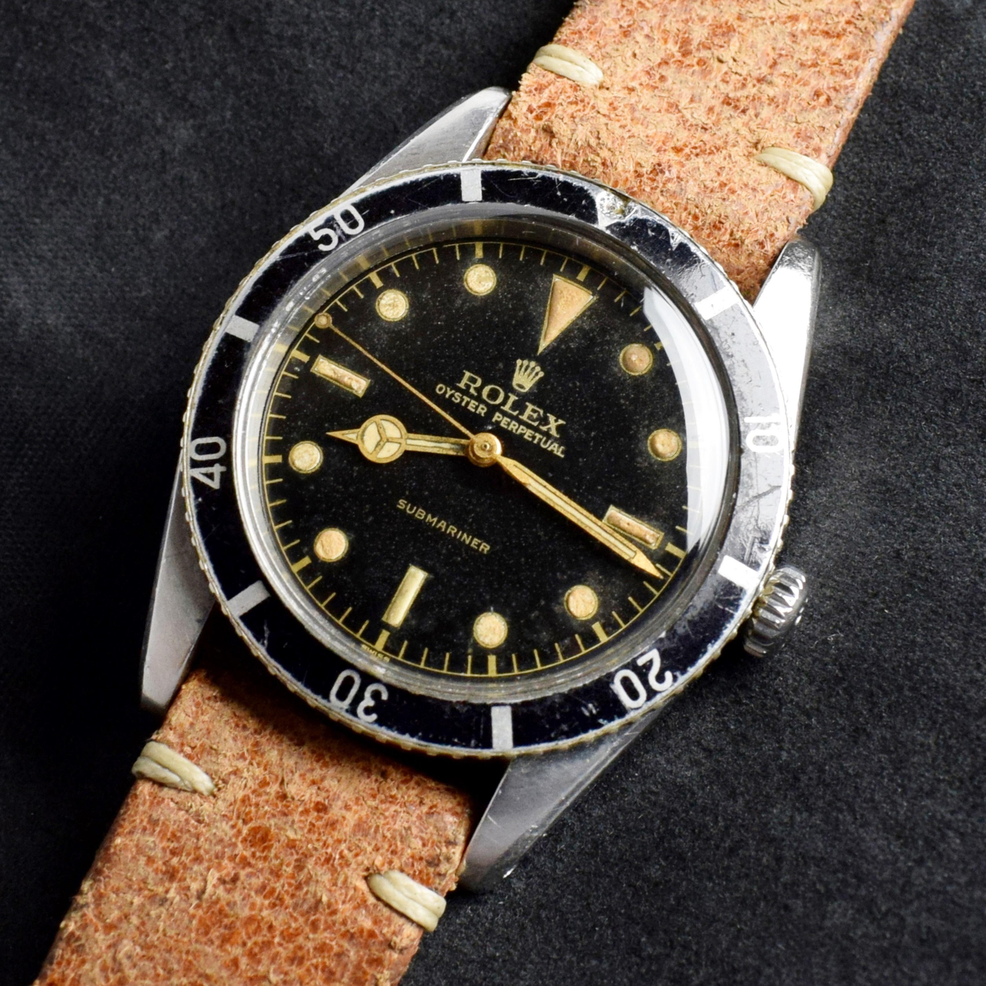 Marke: Vintage Rolex
Modell: 6205
Jahr: 1954
Seriennummer: 21xxx
Referenz: OT1504

Das Modell 6204 wurde 1953 als erste U-Boot-Uhr mit kleiner Krone produziert und garantierte eine Tiefe von 100 Metern. Das Modell 6205 war nach dem Modell 6204