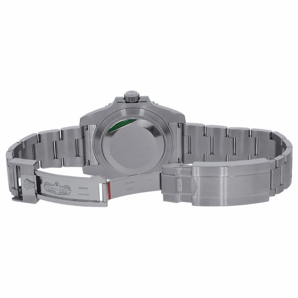 Rolex Submariner Reference #:116610. Rolex Oyster Perpetual Submariner Date 40mm Watch 904L stainless steel case, unidirectional rotatable green Cerachrom time lapse bezel, green gold dial, Chromalight luminescent hands and hour markers, and Oyster