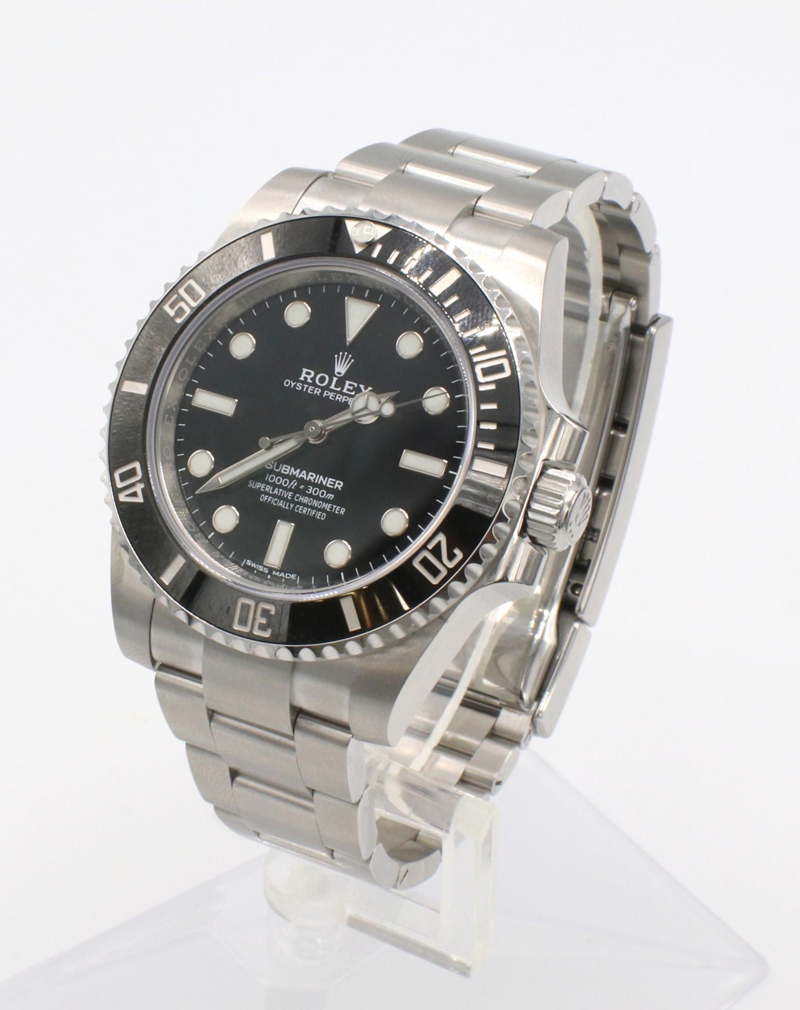 Rolex Submariner Stainless Steel No Date Reference 114060 Watch
Model: 114060
Serial: 7V19**** (Card dated 6/16/2020)
Case: 40mm
Bracelet: Stainless steel oyster, 11 links
Crystal: Sapphire
Movement: Automatic
Notes: Box & Papers