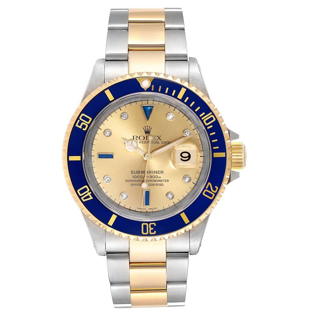 Rolex Submariner Steel Gold Diamond Sapphire Serti Dial Mens Watch 16613. Officially certified chronometer self-winding movement. Stainless steel and 18k yellow gold case 40 mm in diameter. Rolex logo on a crown. Blue insert special time-lapse
