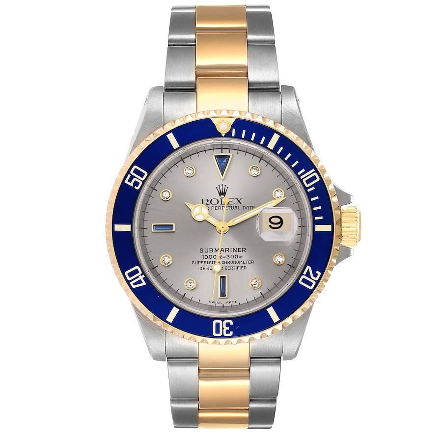 Rolex Submariner Steel Gold Diamond Sapphire Serti Dial Watch 16613 Box Papers. Officially certified chronometer automatic self-winding movement. Stainless steel and 18k yellow gold case 40 mm in diameter. Rolex logo on the crown. Blue insert
