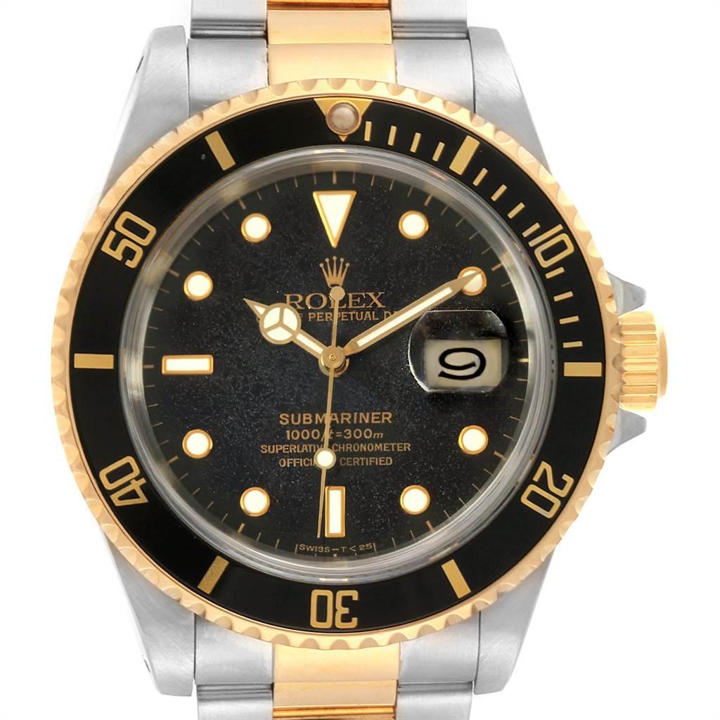 Rolex Submariner Steel Yellow Gold Black Dial Bezel Mens Watch 16613. Officially certified chronometer self-winding movement. Stainless steel and 18k yellow gold case 40 mm in diameter. Rolex logo on a crown. Black insert special time-lapse
