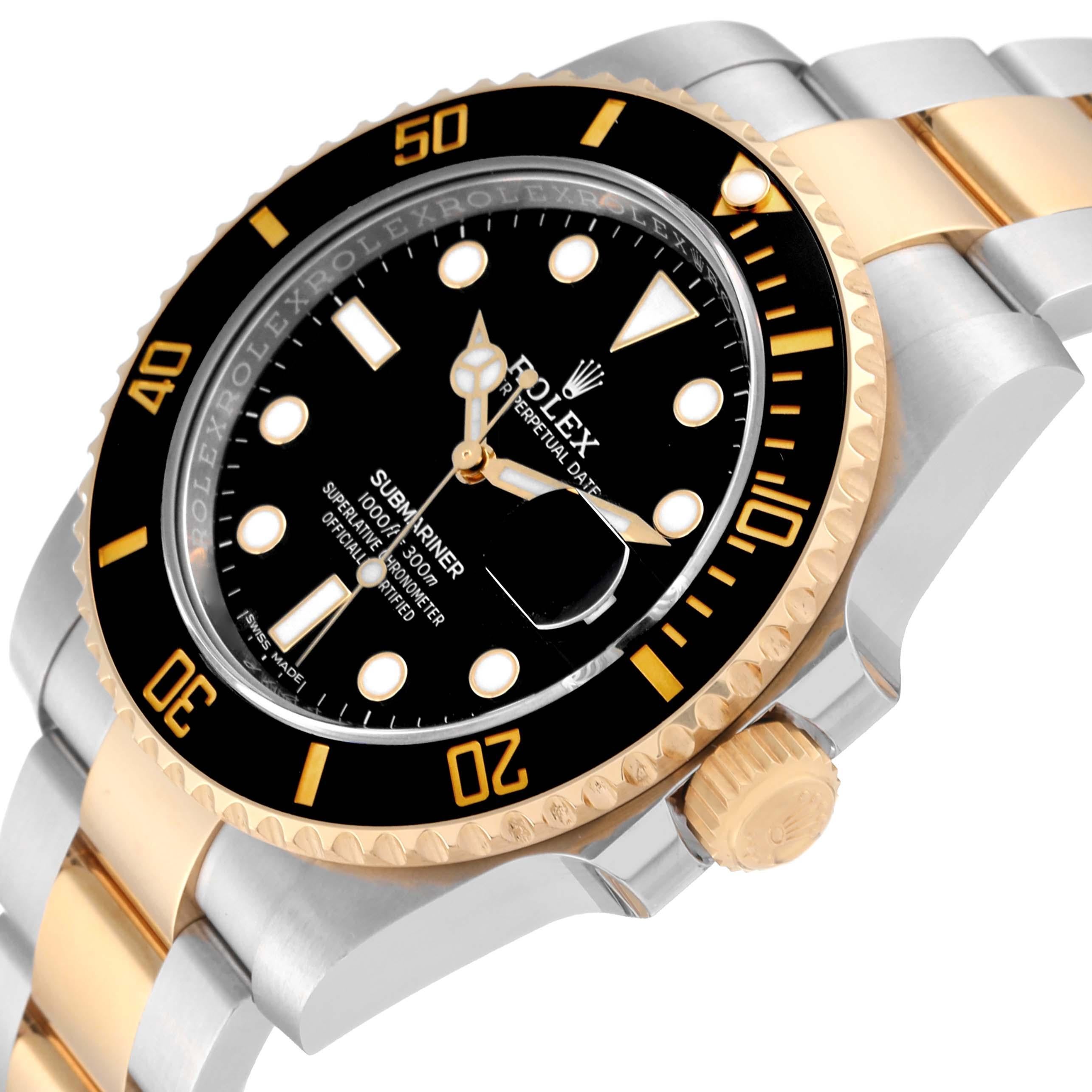 Rolex Submariner Steel Yellow Gold Black Dial Mens Watch 116613 Box Card. Officially certified chronometer automatic self-winding movement. Stainless steel and 18k yellow gold case 40.0 mm in diameter. Rolex logo on a crown. Ceramic Black Ion-plated