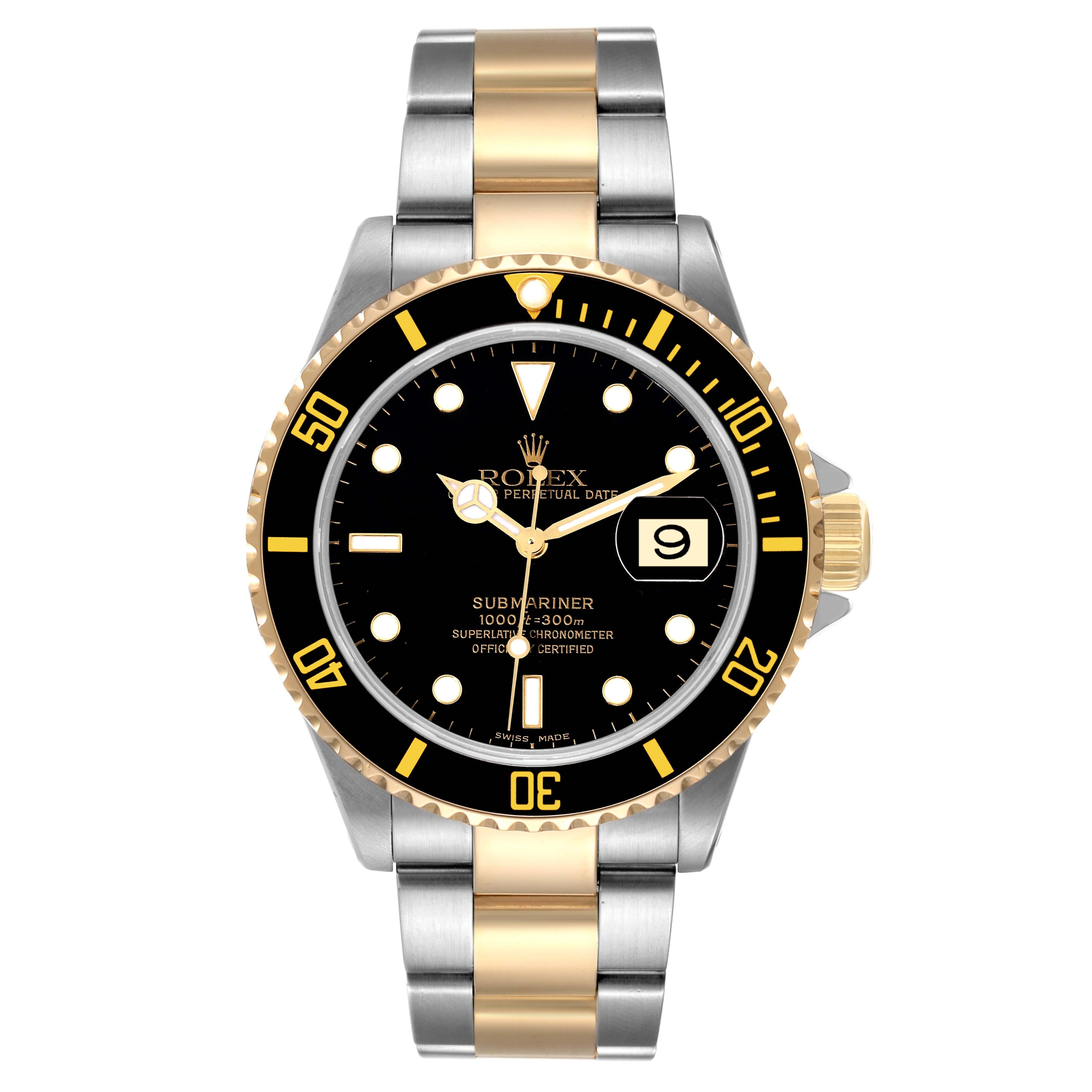 Rolex Submariner Steel Yellow Gold Black Dial Mens Watch 16613 Box Papers. Officially certified chronometer automatic self-winding movement. Stainless steel and 18k yellow gold case 40 mm in diameter. Rolex logo on the crown. Special time-lapse