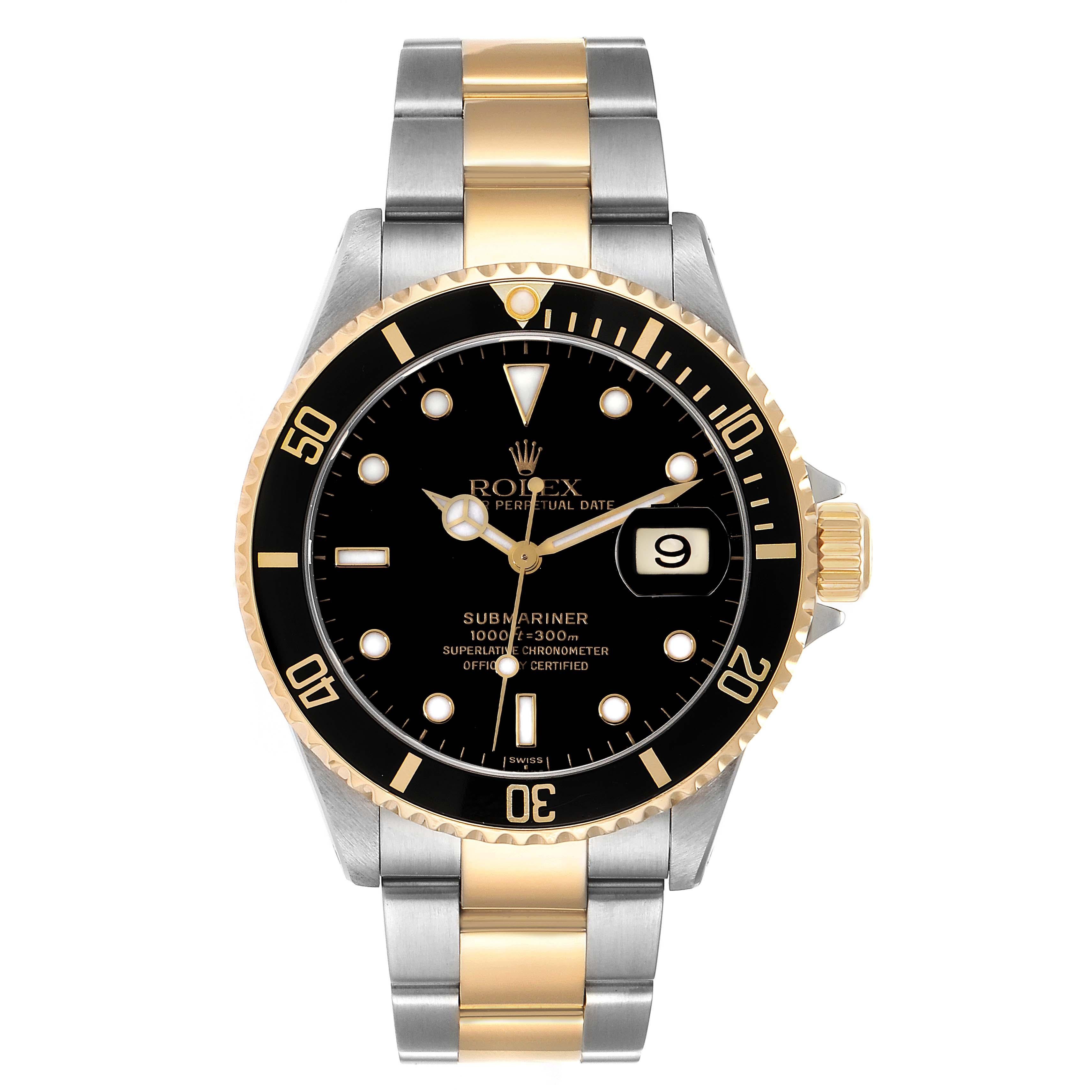Rolex Submariner Steel Yellow Gold Black Dial Mens Watch 16613 Box Papers. Officially certified chronometer automatic self-winding movement. Stainless steel and 18k yellow gold case 40 mm in diameter. Rolex logo on the crown. Special time-lapse
