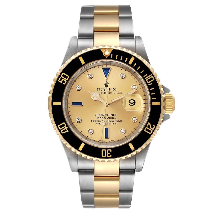 Rolex Submariner Steel Yellow Gold Diamond Sapphire Serti Dial Mens Watch 16613. Officially certified chronometer automatic self-winding movement. Stainless steel and 18k yellow gold case 40 mm in diameter. Rolex logo on the crown. Scratch resistant
