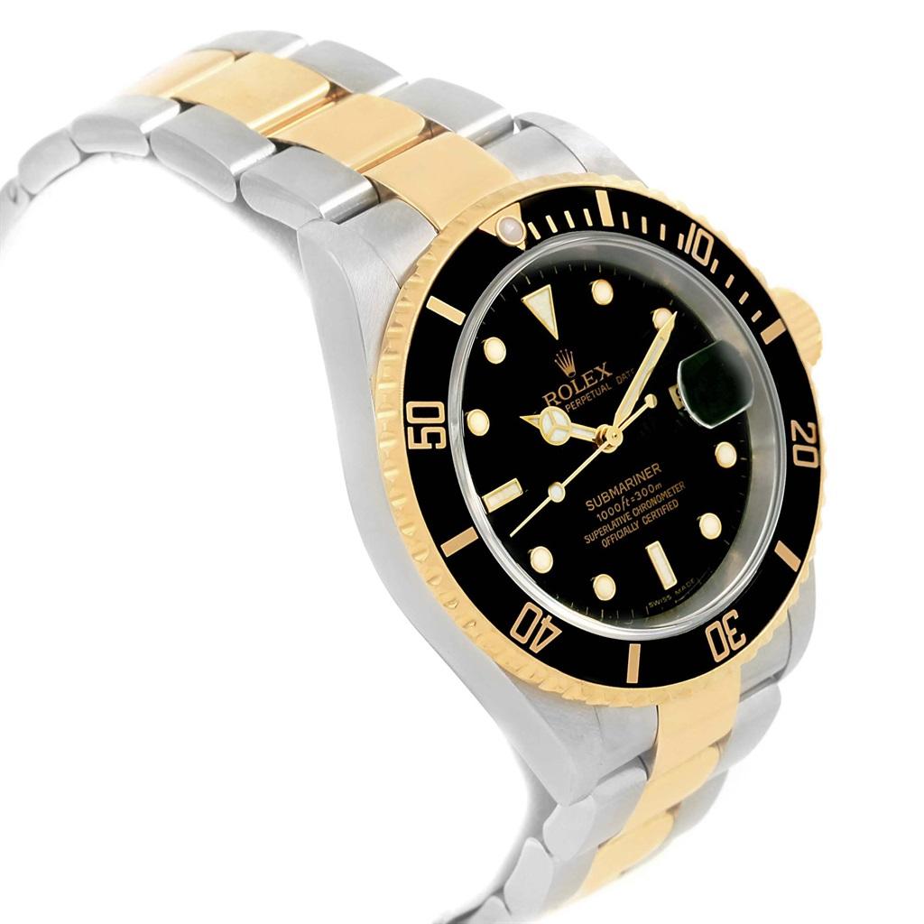 Rolex Submariner 40mm Steel Yellow Gold Mens Watch 16613 Box Papers. Officially certified chronometer self-winding movement. Stainless steel and 18k yellow gold case 40 mm in diameter. Rolex logo on a crown. Black insert special time-lapse