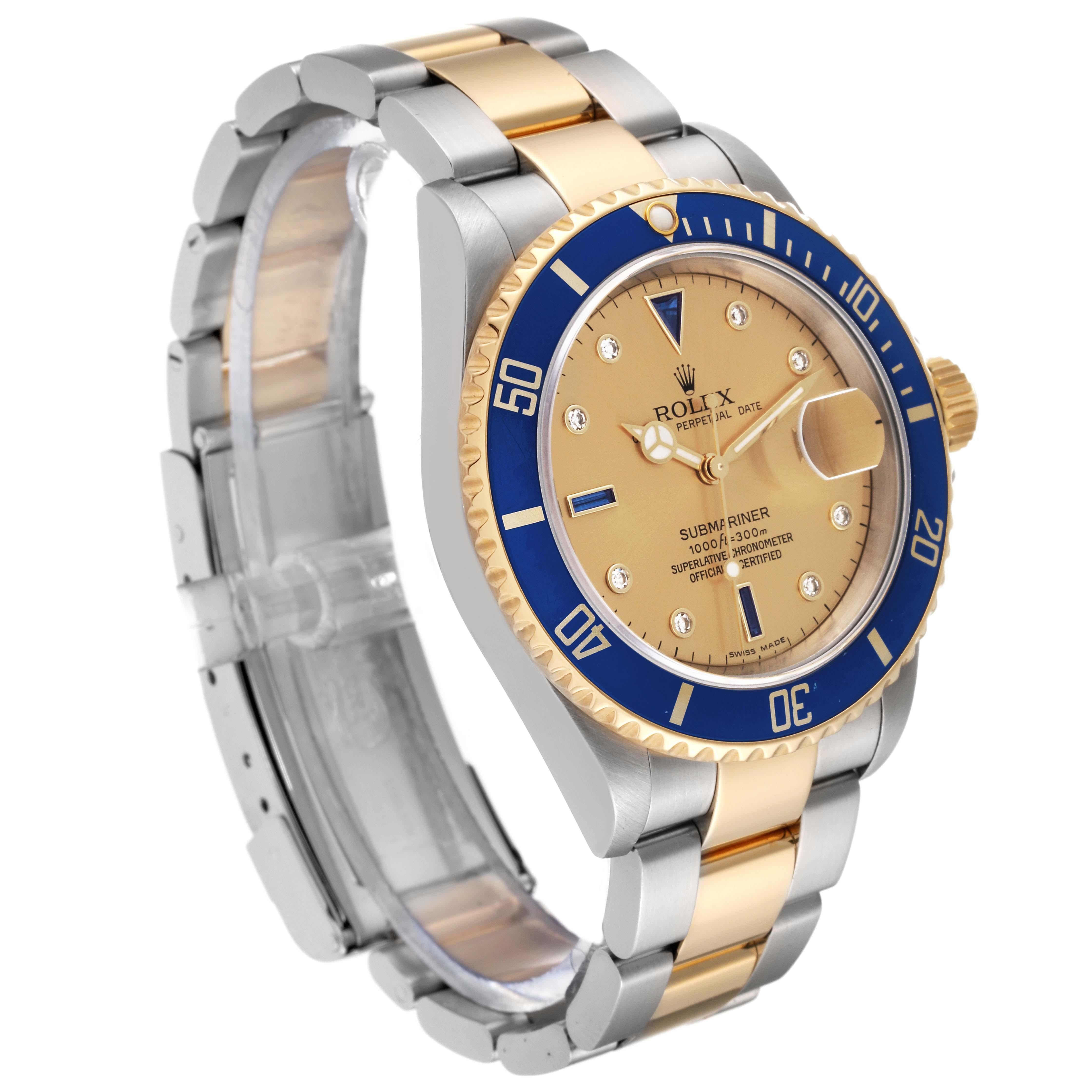 Rolex Submariner Steel Yellow Gold Serti Dial Mens Watch 16613 Box Papers. Officially certified chronometer automatic self-winding movement. Stainless steel and 18k yellow gold case 40 mm in diameter. Rolex logo on the crown. Blue insert special