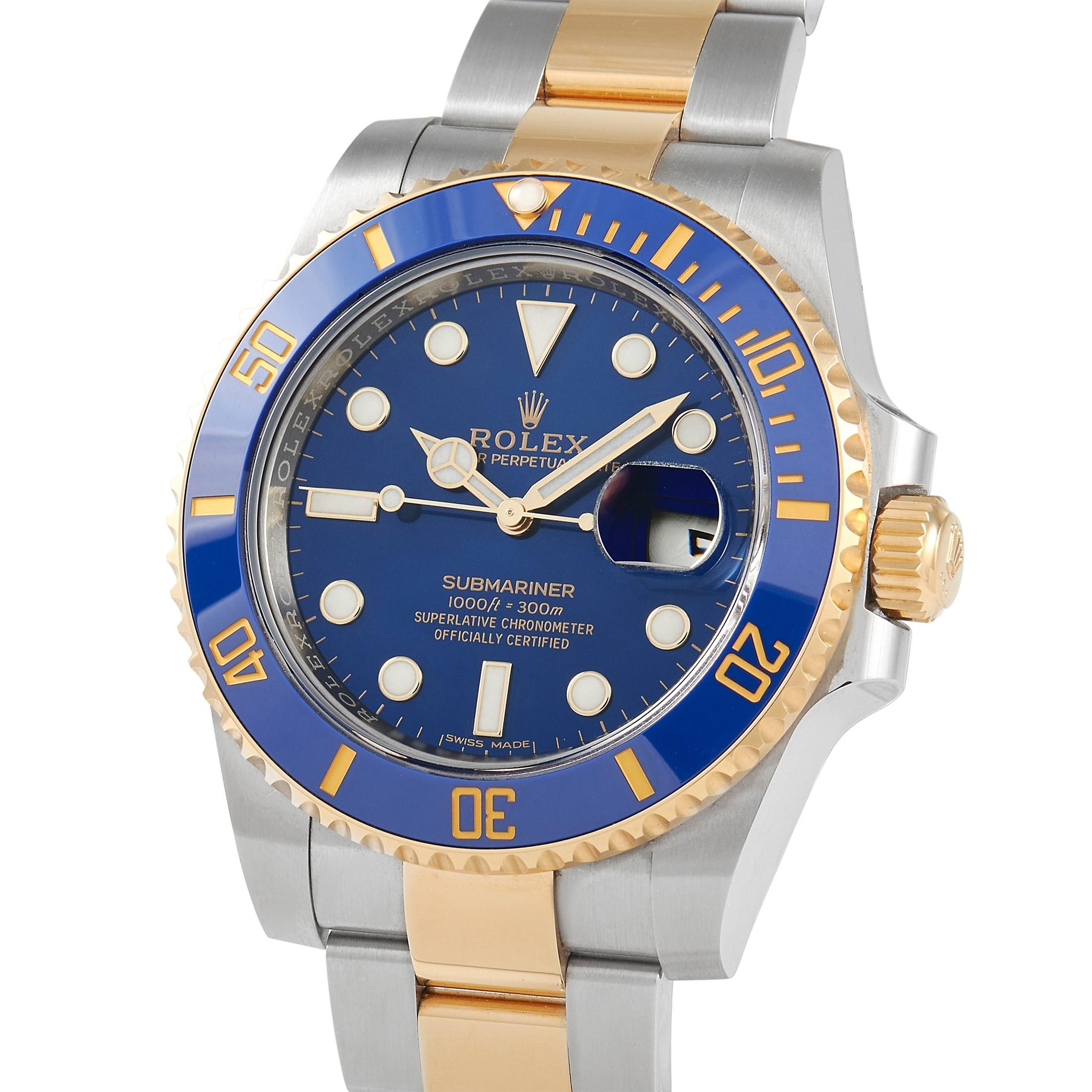 This Rolex Submariner Oyster Perpetual Datejust 40 mm Watch, reference number 116613LB, features an oystersteel case measuring 40 mm in diameter and includes a bright blue and gold rotating fluted bezel. It is presented on a matching white and