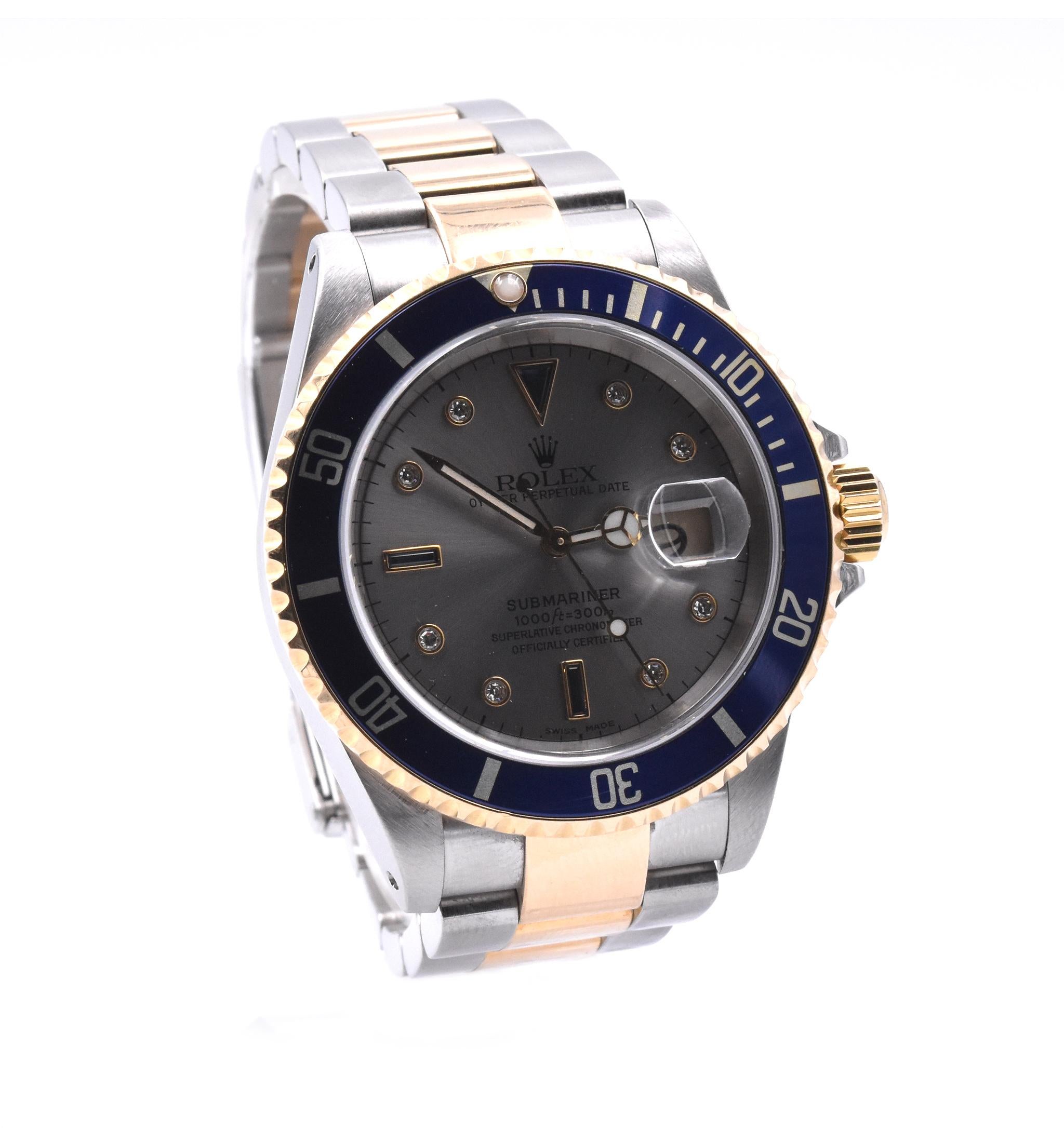 Designer: Rolex
Movement: automatic 
Function: hours, minutes, seconds, date
Case: 40mm stainless-steel case, sapphire crystal, 18k yellow gold bezel with blue insert, yellow gold screw-down crown, waterproof to 100 meters
Band: two-tone 18k yellow