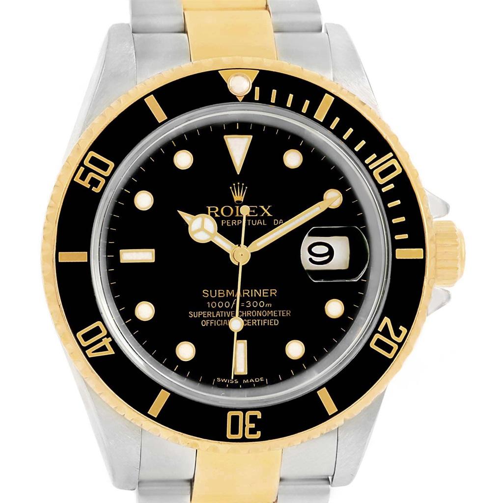 Rolex Submariner 40mm Two Tone Steel Yellow Gold Mens Watch 16613. Officially certified chronometer automatic self-winding movement. Stainless steel and 18k yellow gold case 40 mm in diameter. Rolex logo on a crown. Black insert special time-lapse