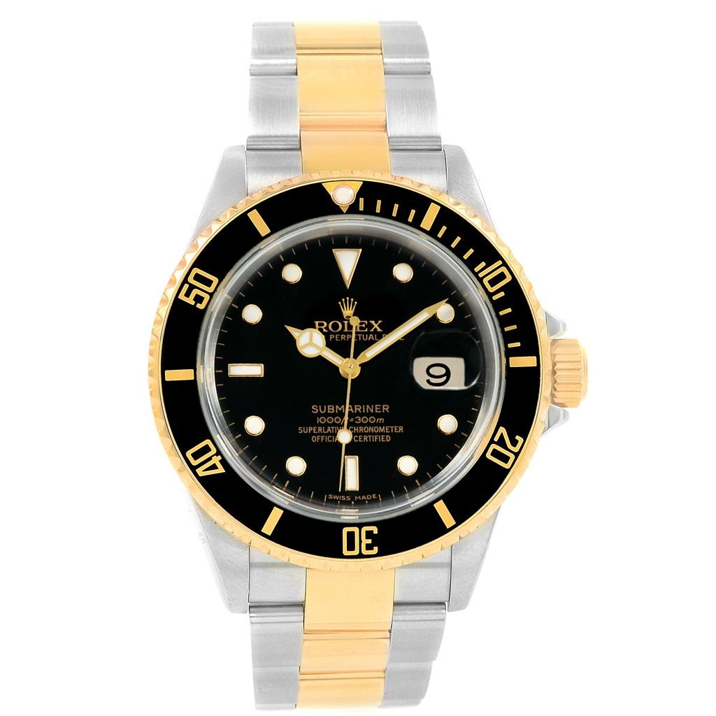 Rolex Submariner 40mm Two Tone Steel Yellow Gold Mens Watch 16613. Officially certified chronometer self-winding movement. Stainless steel and 18k yellow gold case 40 mm in diameter. Rolex logo on a crown. Black insert special time-lapse