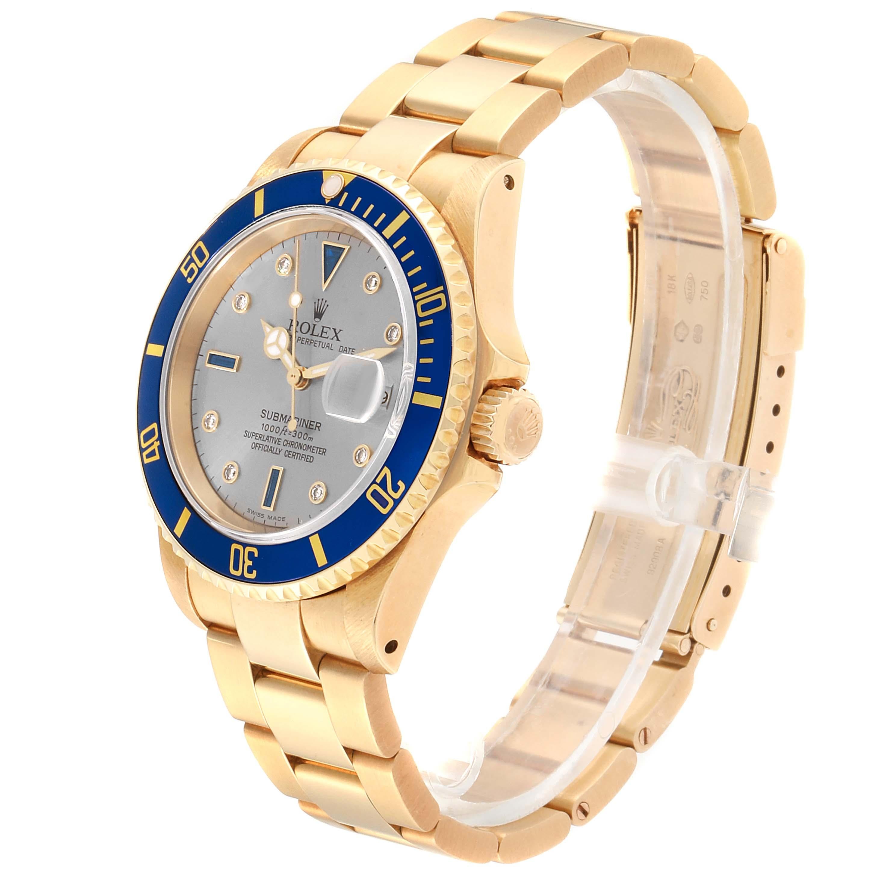 Rolex Submariner Yellow Gold Diamond Sapphire Serti Dial Watch 16618 In Excellent Condition In Atlanta, GA