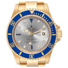 Rolex Submariner Yellow Gold Diamond Sapphire Serti Dial Watch 16618