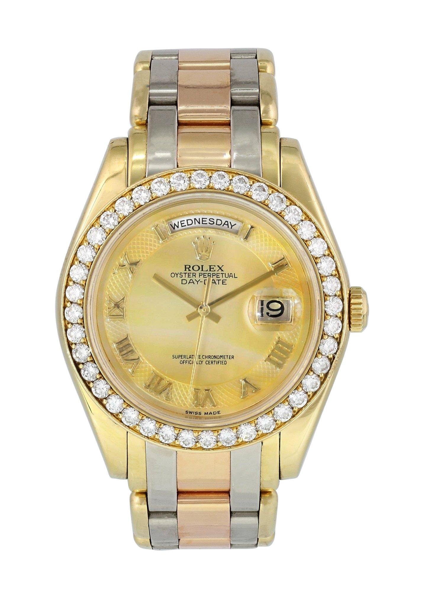 Rolex Tridor Day Date Perlmaster 18948  Mens Watch.
39mm 18k Yellow Gold case. 
Yellow Gold Stationary bezel with factory set diamonds. 
Mother-of-Pearl dial with gold hands and Roman numeral hour markers. 
Minute markers on the outer dial. 
Date