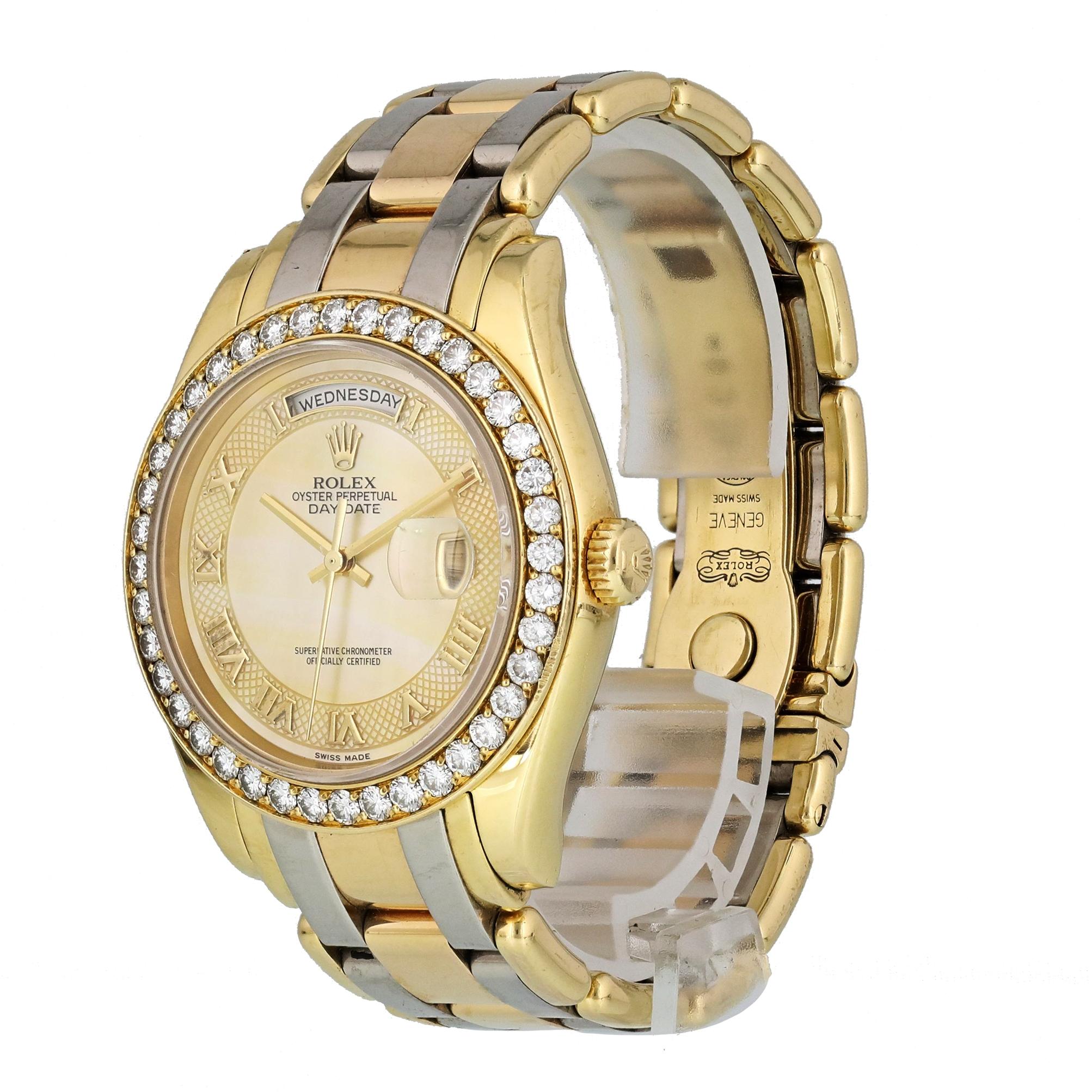 Rolex Tridor Day Date Perlmaster 18948  Mens Watch.
39mm 18k Yellow Gold case. 
Yellow Gold Stationary bezel with factory set diamonds. 
Mother-of-Pearl dial with gold hands and Roman numeral hour markers. 
Minute markers on the outer dial. 
Date