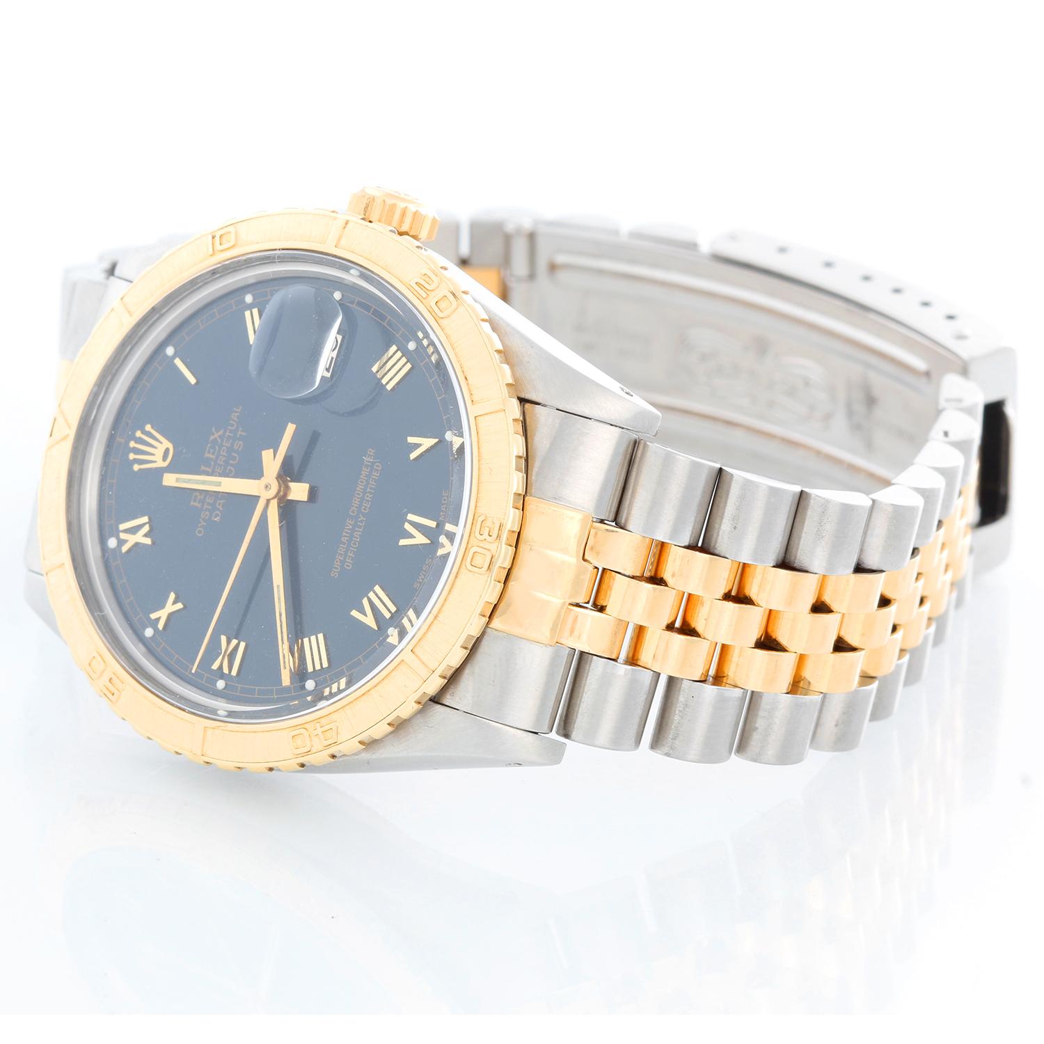 Rolex Turnograph Men's 2-Tone Watch 16253 - Automatic winding, Quickset, acrylic crystal. Stainless steel case with 18k yellow gold bezel. Blue dial with skinny hour markers. Stainless steel and 18k yellow gold Jubilee bracelet. Pre-owned with