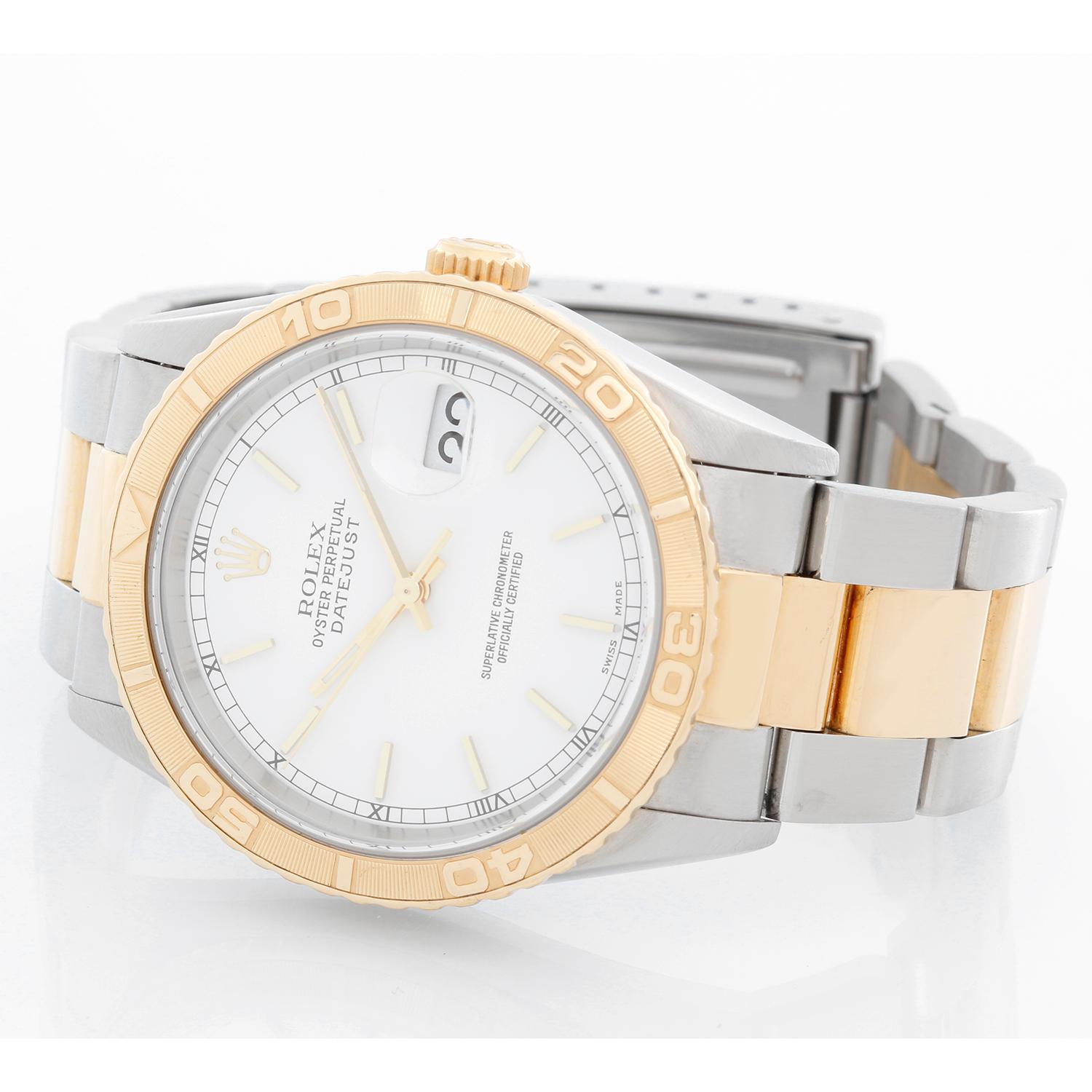 Rolex Turnograph Men's 2-Tone Watch 16263 -  Automatic winding, Quickset, sapphire crystal. Stainless steel case with 18k yellow gold bezel (36mm diameter). White dial with gold stick markers. Stainless steel and 18k yellow gold Jubilee bracelet.