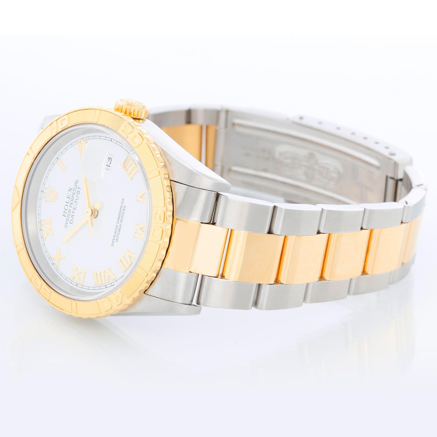 Rolex Turnograph Men's 2-Tone Watch 16263 - Automatic winding, Quickset, sapphire crystal. Stainless steel case with 18k yellow gold bezel. White dial with roman numerals. Stainless steel and 18k yellow gold Jubilee bracelet. Pre-owned with custom