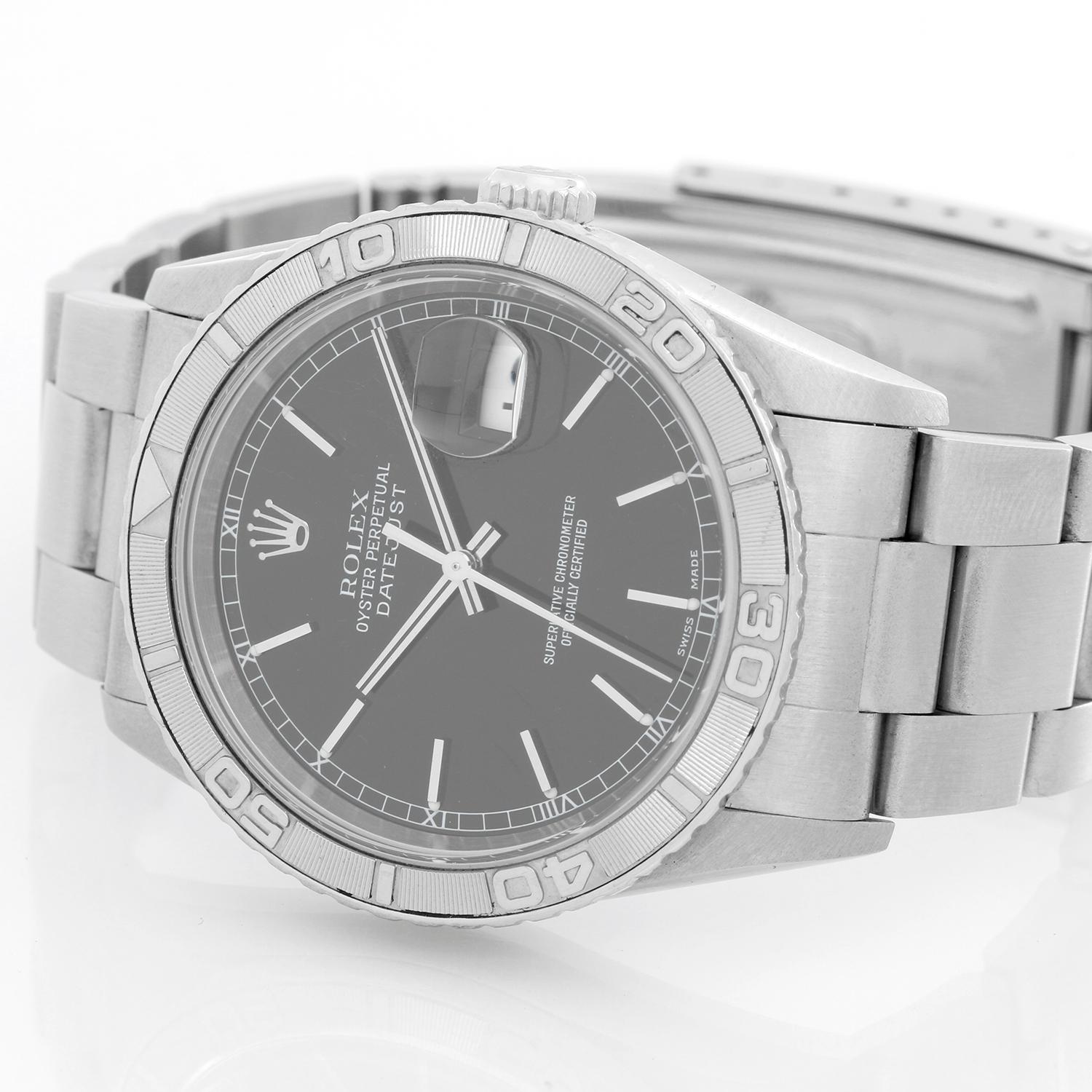 Rolex Turnograph Men's Steel Watch with Thunderbird Bezel 16264 -  Automatic winding, 31 jewels, Quickset, sapphire crystal. Stainless steel case with Thunderbird bezel (36mm diameter). White dial with Roman numerals. Stainless steel Oyster
