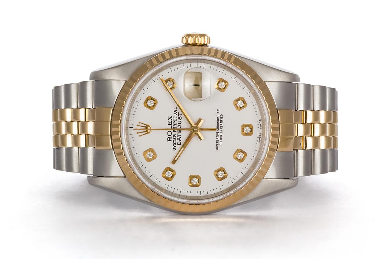 We are pleased to offer this 1990 Rolex Two Tone 18k & Stainless Steel 36mm Datejust 16233. This is a great Rolex for a man or a woman especially with women wearing larger watches these days. It features an aftermarket diamond dial and Rolex factory