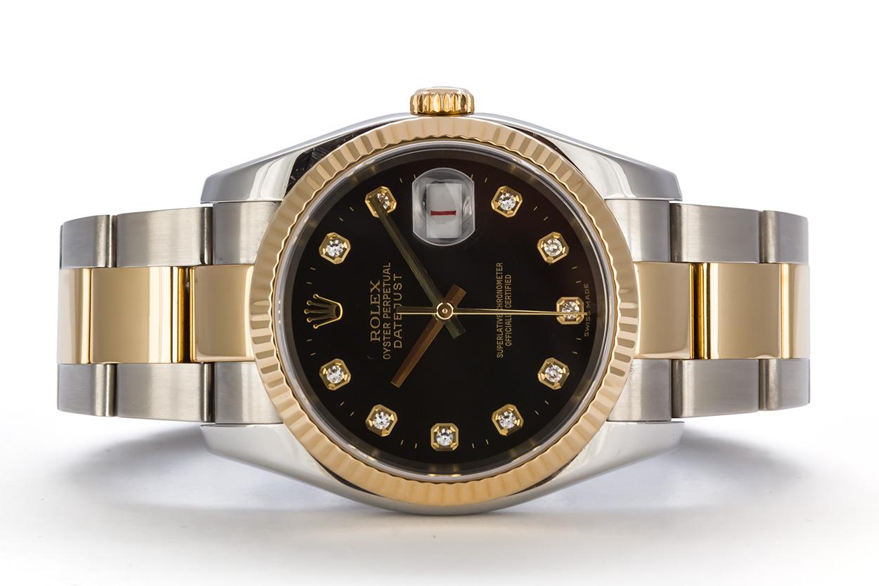 We are pleased to offer this 2003 Rolex Two Tone 18k Gold & Stainless Steel 36mm Datejust 116233. This is a great Rolex for a man or a woman especially with women wearing larger watches these days. It features an Rolex factory black diamond dial,