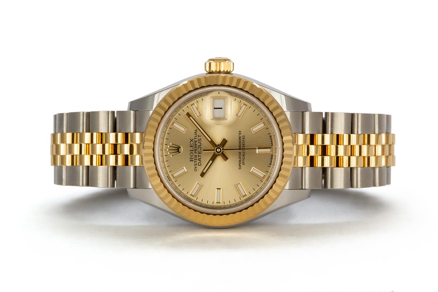 We are pleased to offer this 2019 Rolex Two Tone 18k Yellow Gold & Stainless Steel 28mm Datejust 279173, still under factory warranty. It features a Rolex factory champagne stick dial with yellow gold markers and hands, Rolex factory 18k yellow gold