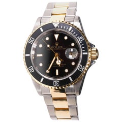 Used Rolex Two-Tone Black Ceramic Submariner 18 Karat Gold and Stainless Steel