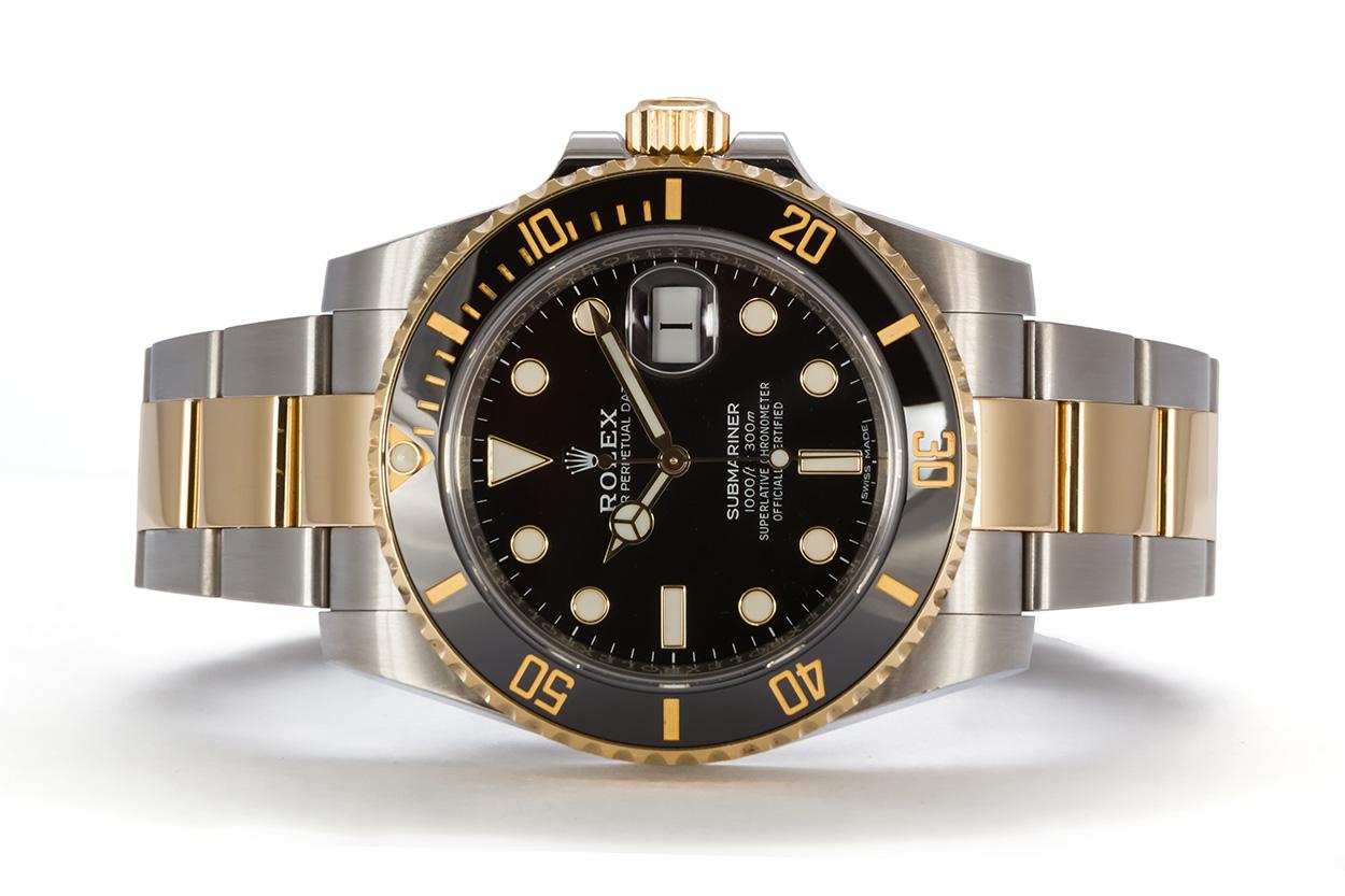 We are pleased to offer this 2019 Rolex Mens Two Tone Submariner 116613LN. It features a 40mm stainless steel case with black dial, 18k yellow gold bezel with black ceramic insert, engraved inner bezel, scrambled serial number, stainless steel and