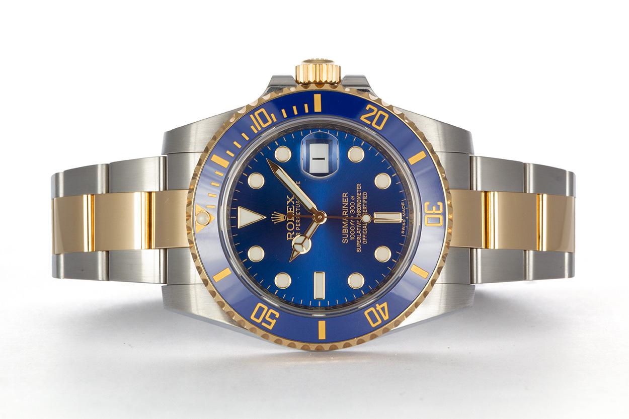 We are pleased to offer this 2013 Rolex Mens Two Tone Submariner 116613. It features a 40mm stainless steel case with blue dial, 18k yellow gold bezel with blue ceramic insert, engraved inner bezel, scrambled serial number, stainless steel and 18k