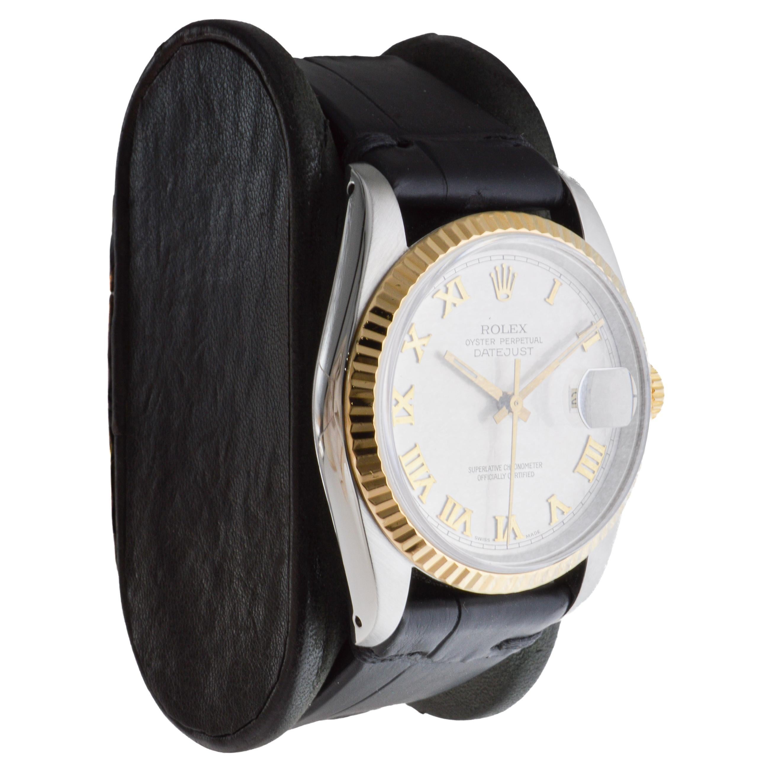 FACTORY / HOUSE: Rolex Watch Company
STYLE / REFERENCE: Oyster Perpetual Datejust / Reference 16200
METAL / MATERIAL: Two Tone 18Kt. and Steel 
CIRCA / YEAR: 1990
DIMENSIONS / SIZE: Length 44mm X Diameter 36mm
MOVEMENT / CALIBER: Perpetual Winding /