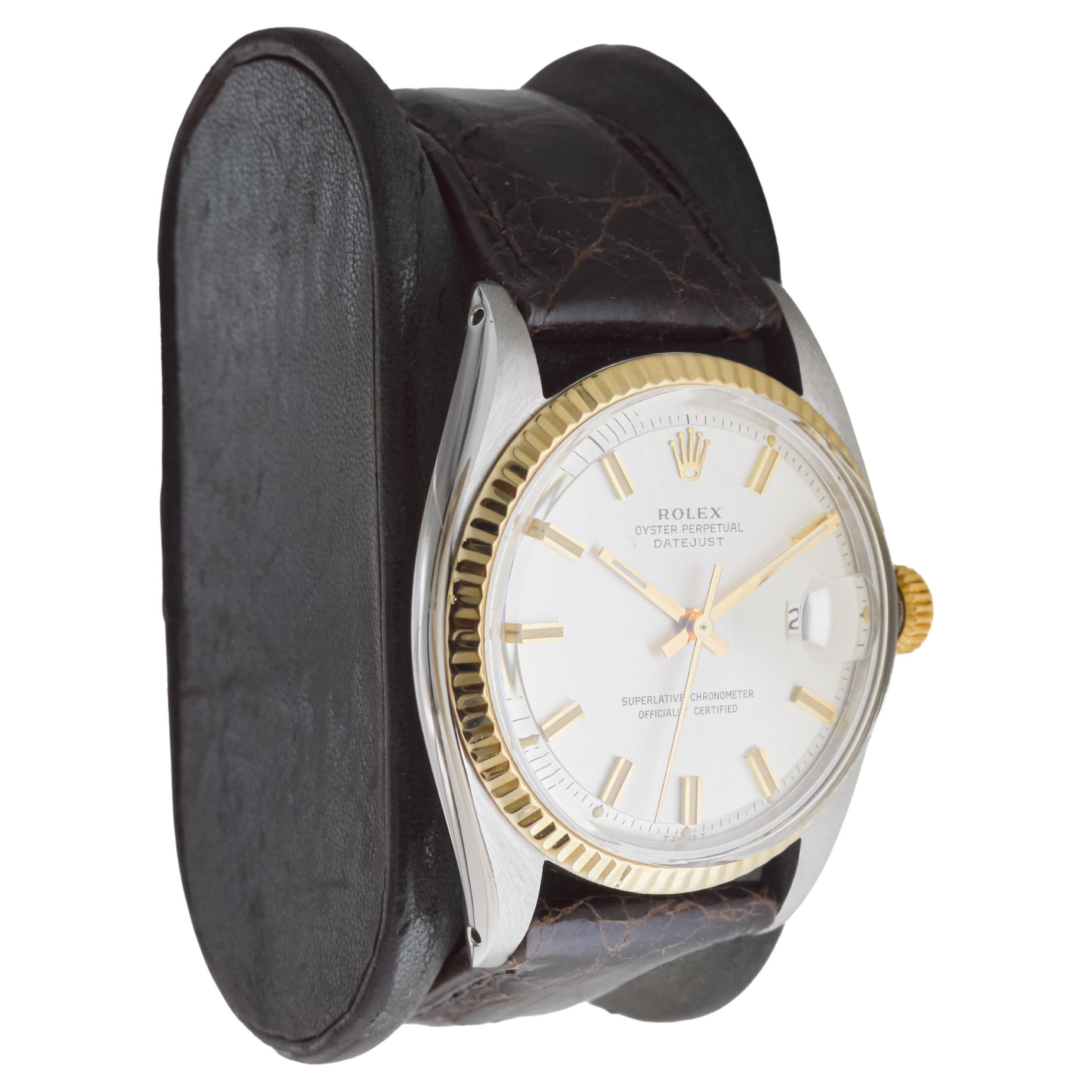 FACTORY / HOUSE: Rolex Watch Company
STYLE / REFERENCE: Datejust / Reference 
METAL / MATERIAL: Two Tone Steel and 14Kt. Solid Gold Bezel
CIRCA / YEAR: 1960's
DIMENSIONS / SIZE: Length 44mm X Diameter 36mm
MOVEMENT / CALIBER: Perpetual Winding / 26