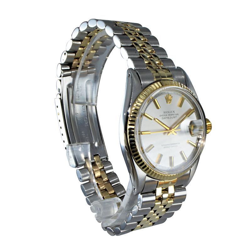 FACTORY / HOUSE: Rolex Watch Co
STYLE / REFERENCE: Oyster Perpetual Datejust / Ref 1601
METAL / MATERIAL: Stainless Steel / 14Kt Yellow Gold
DIMENSIONS / SIZE: 44mm x 36mm
MOVEMENT / CALIBER: Perpetual Winding / 26 Jewels 
DIAL / HANDS: Original