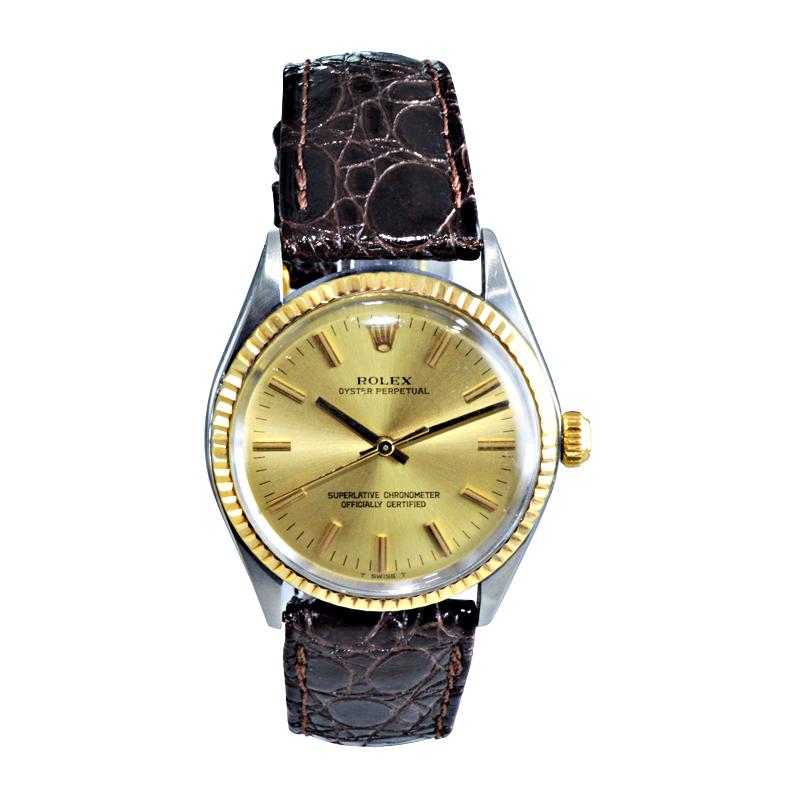 FACTORY / HOUSE:  Rolex Watch Company
STYLE / REFERENCE: Oyster Perpetual / Ref. 1005
METAL / MATERIAL: Stainless Steel and 14Kt. Yellow Gold 
CIRCA: 1971 / 1972
DIMENSIONS: 38mm X 33mm
MOVEMENT / CALIBER: Perpetual Winding / 26 Jewels / Ref.