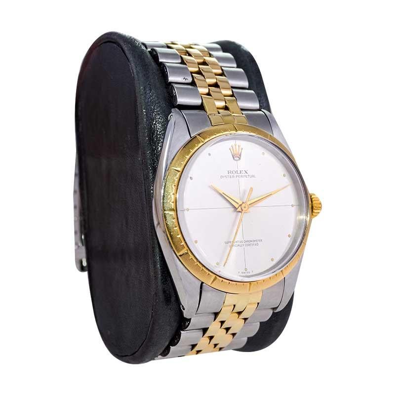 FACTORY / HOUSE: Rolex Watch Company
STYLE / REFERENCE: Zephyr / Reference 1008
METAL / MATERIAL: 2 Tone Stainless Steel and 14Kt. Yellow Gold Fluted Bezel
DIMENSIONS: Length 41.5mm  X Diameter 34mm
CIRCA: 1964
MOVEMENT / CALIBER: 26 Jewels / Oyster