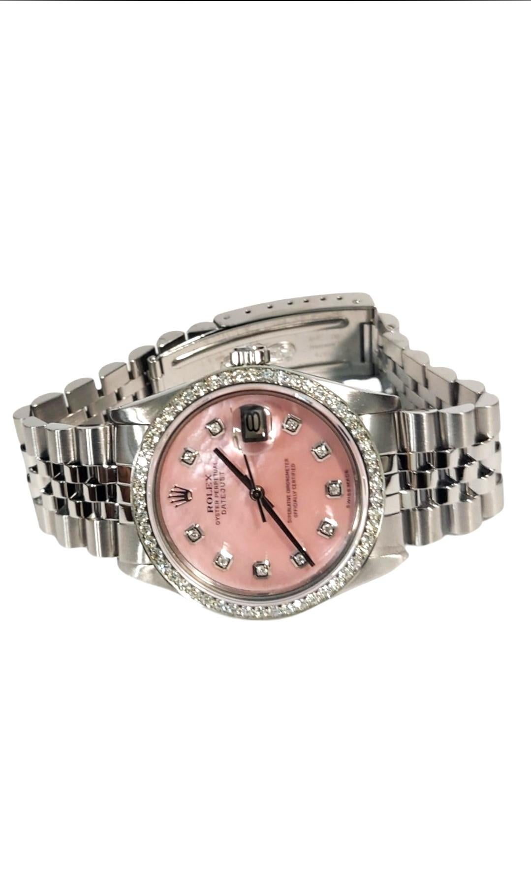 Beschreibung
Marke - Rolex
Modell - 16014
Stil - Datejust 
Gehäusegröße - 36mm 
Lünette - 1,0CT Stahldiamant 
Zifferblatt - rosa MOP-Diamant 
Kristall - Saphir 
Uhrwerk - Rolex Automatik Cal-3035
Band - Edelstahl Jubilee

Neue generische Uhrenbox