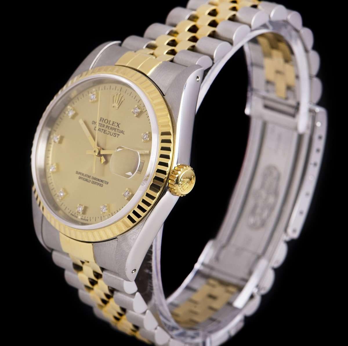 An Unworn Stainless Steel and 18k Yellow Gold Oyster Perpetual Datejust NOS Gents Wristwatch, champagne dial with 10 applied round brilliant cut diamond hour markers, date at 3 0'clock, a fixed 18k yellow gold fluted bezel, a stainless steel and 18k