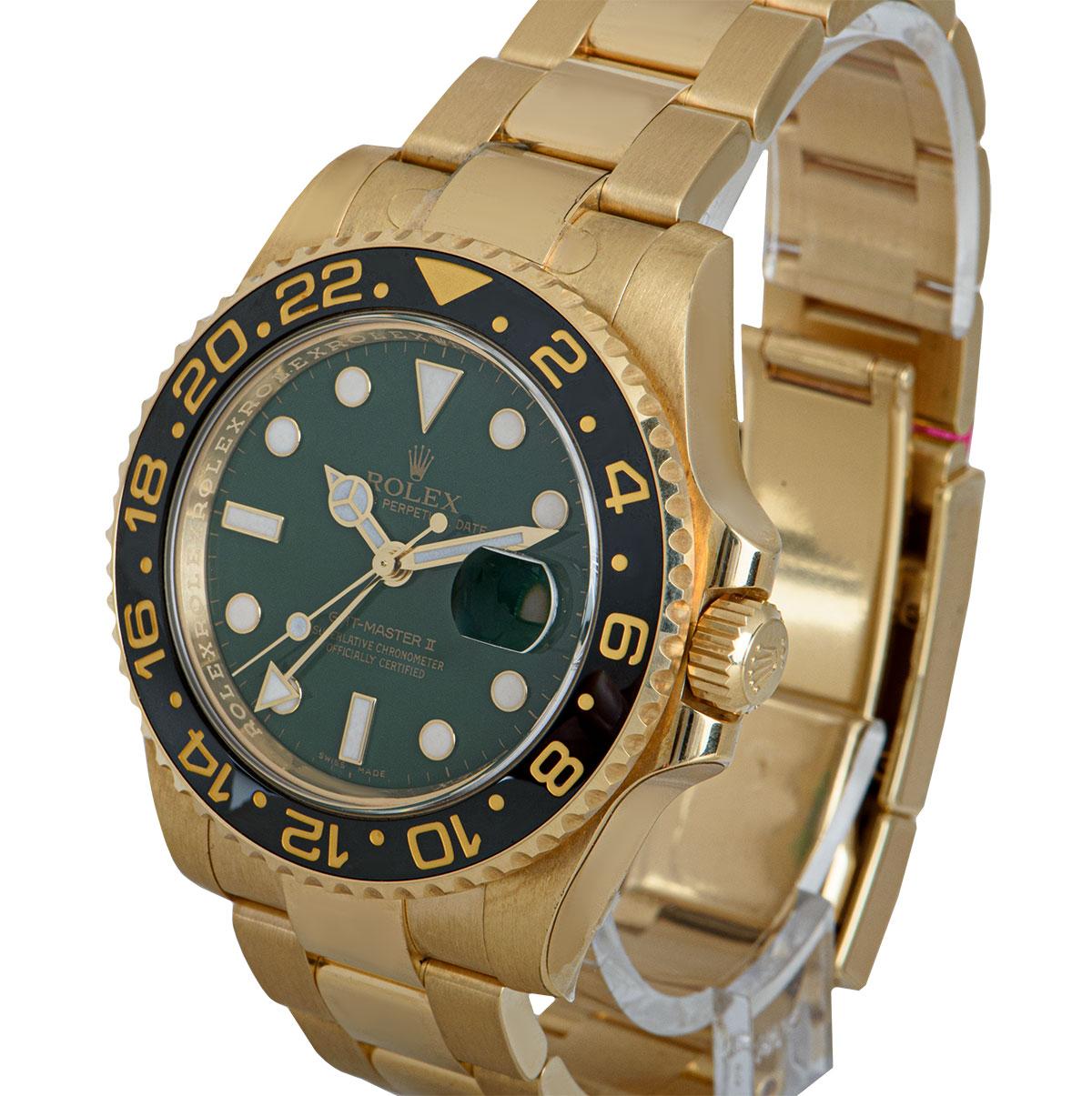 A 40 mm Unworn 18k Yellow Gold Oyster Perpetual GMT-Master II NOS Gents Wristwatch, green dial with applied hour markers, date at 3 0'clock, an 18k yellow gold bi-directional rotatatable 24 hour bezel with a black ceramic bezel insert, an 18k yellow