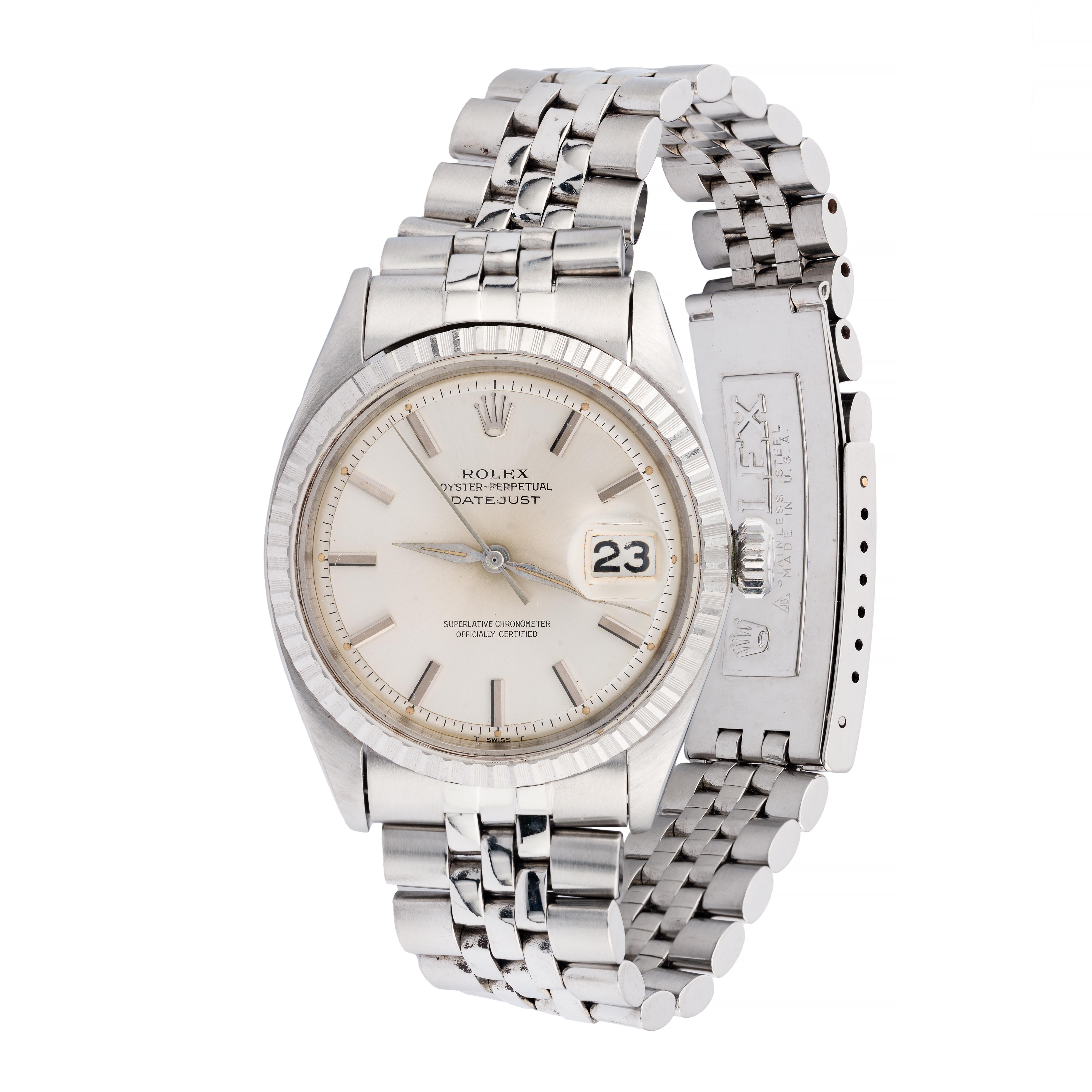 Aston Estate Jewelry Presents:

A distinguished Rolex Datejust wristwatch crafted in stainless steel.

The round watch features a silver sunburst dial with precise baton indexes and the Rolex signature, underscoring its Swiss craftsmanship. The dial