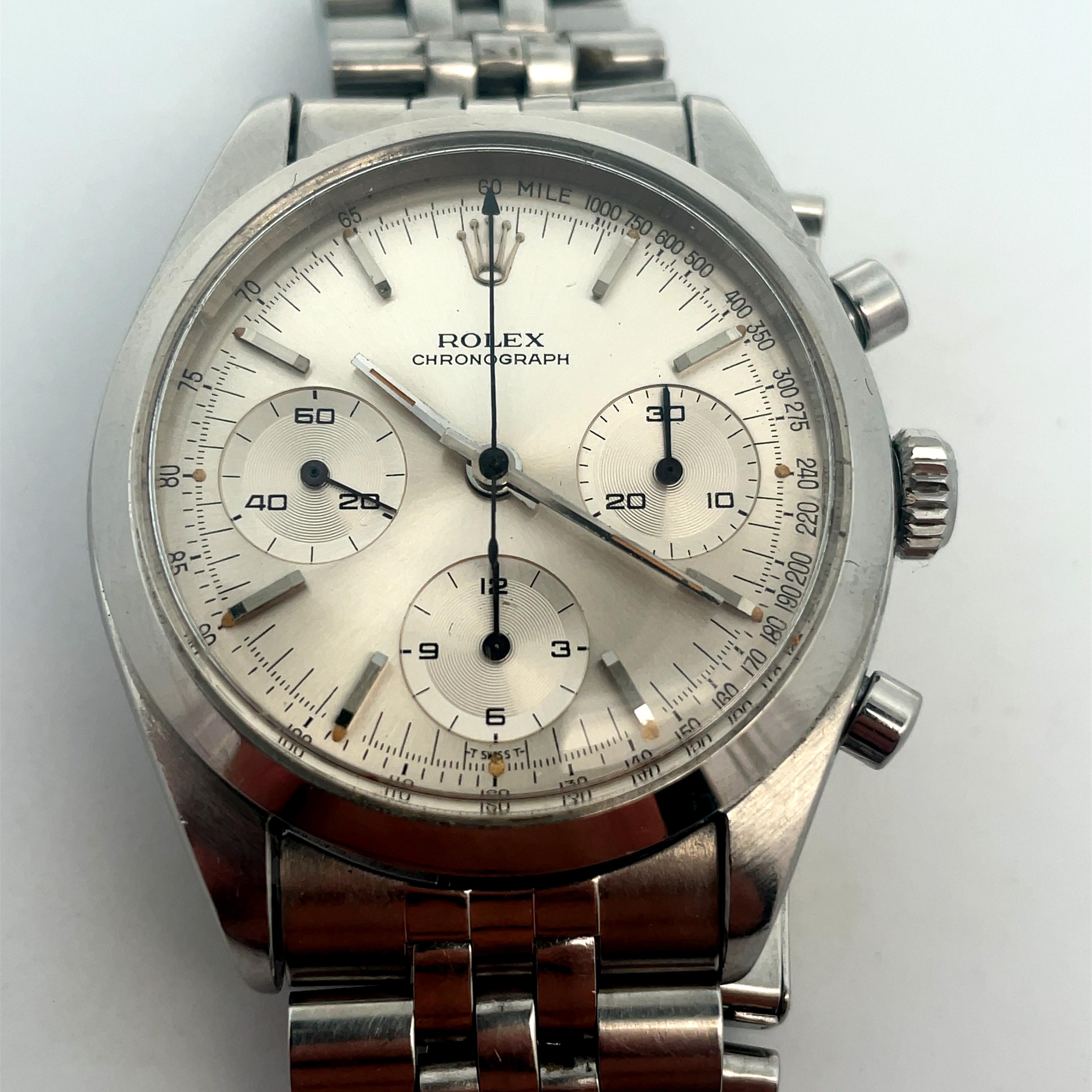 An extremely rare vintage Rolex Chronograph labelled as the ''Pre Daytona'' due to its production before the famous Daytona. Features a silver dial with applied hour markers and chronograph counters.
This watch is in stunning condition and has never