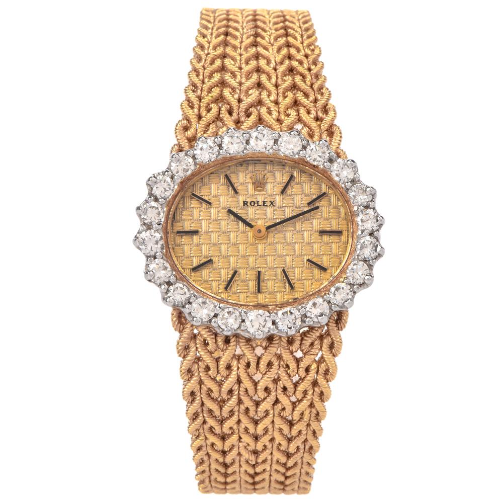 This Rolex Vintage Ladies 18k Yellow Gold Diamond Watch is just a beauty. All 100% authentic, original Rolex manual mechanical winding movement, Original Rolex in18k yellow gold with 18K white gold back round case with the oval shape 30mm x 25mm.