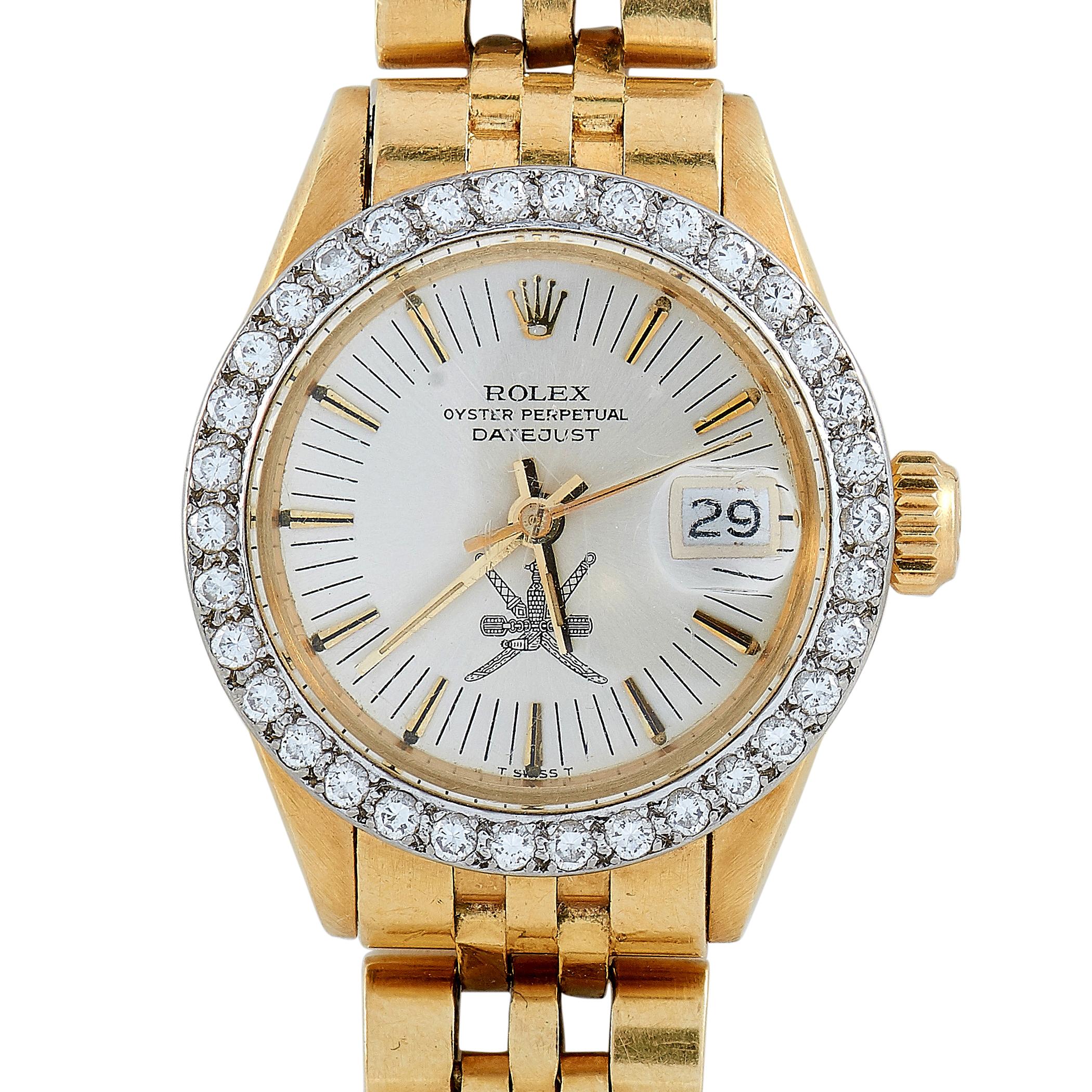 The Rolex Lady Datejust Khanjar watch, reference number 6913,3553920, boasts an 18K yellow gold case fitted with a diamond-set 18K white gold bezel. The case is presented on an 18K yellow gold Jubilee bracelet. The dial is accentuated with the Omani