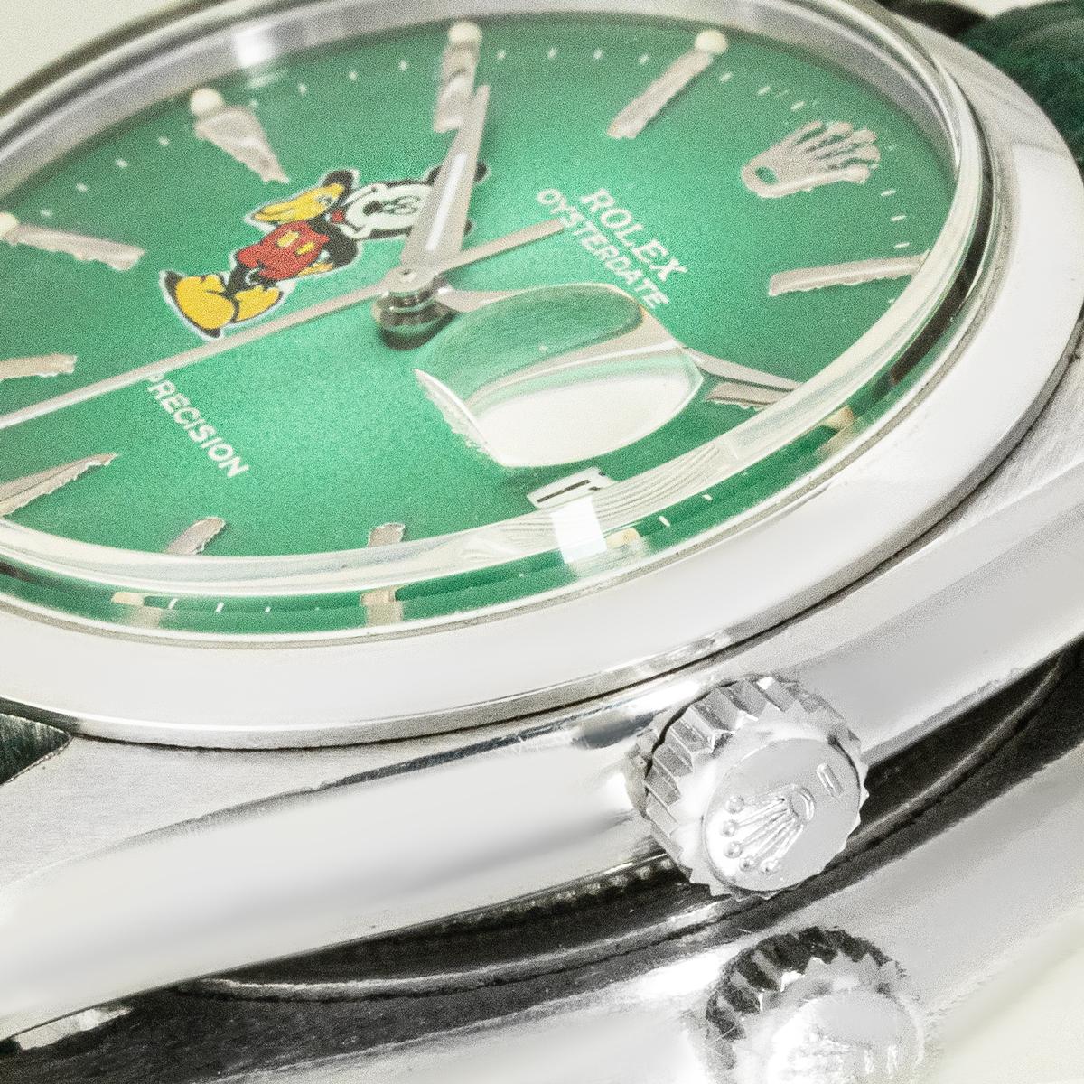 Eine Vintage-Oysterdate-Präzisionsarmbanduhr von Rolex. Der aus Edelstahl gefertigte Zeitmesser verfügt über ein grünes Zifferblatt mit applizierten Stundenmarkierungen, eine Datumsanzeige und eine Abbildung von 