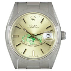 Montre Rolex Vintage Oyster Date en acier inoxydable cadran saoudien champagne 6694