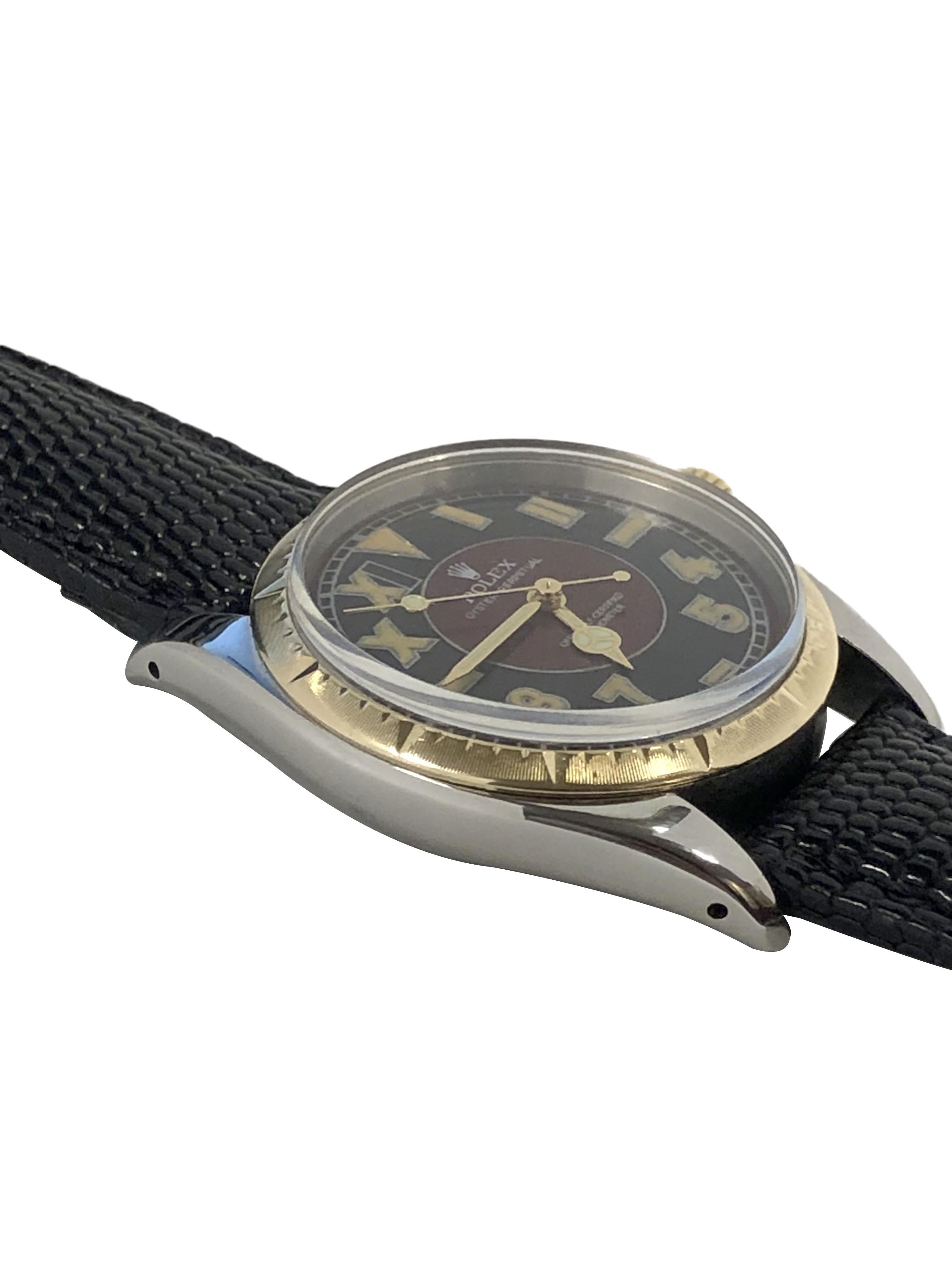 Circa 1966 Rolex Oyster perpetual Reference 6582 Wrist Watch, 34 M.M. 3 piece stainless steel Oyster case with Yellow Gold Zephyre Bezel and Gold Crown. Caliber 1030, Automatic, self winding movement, Custom refinished two color California Dial with