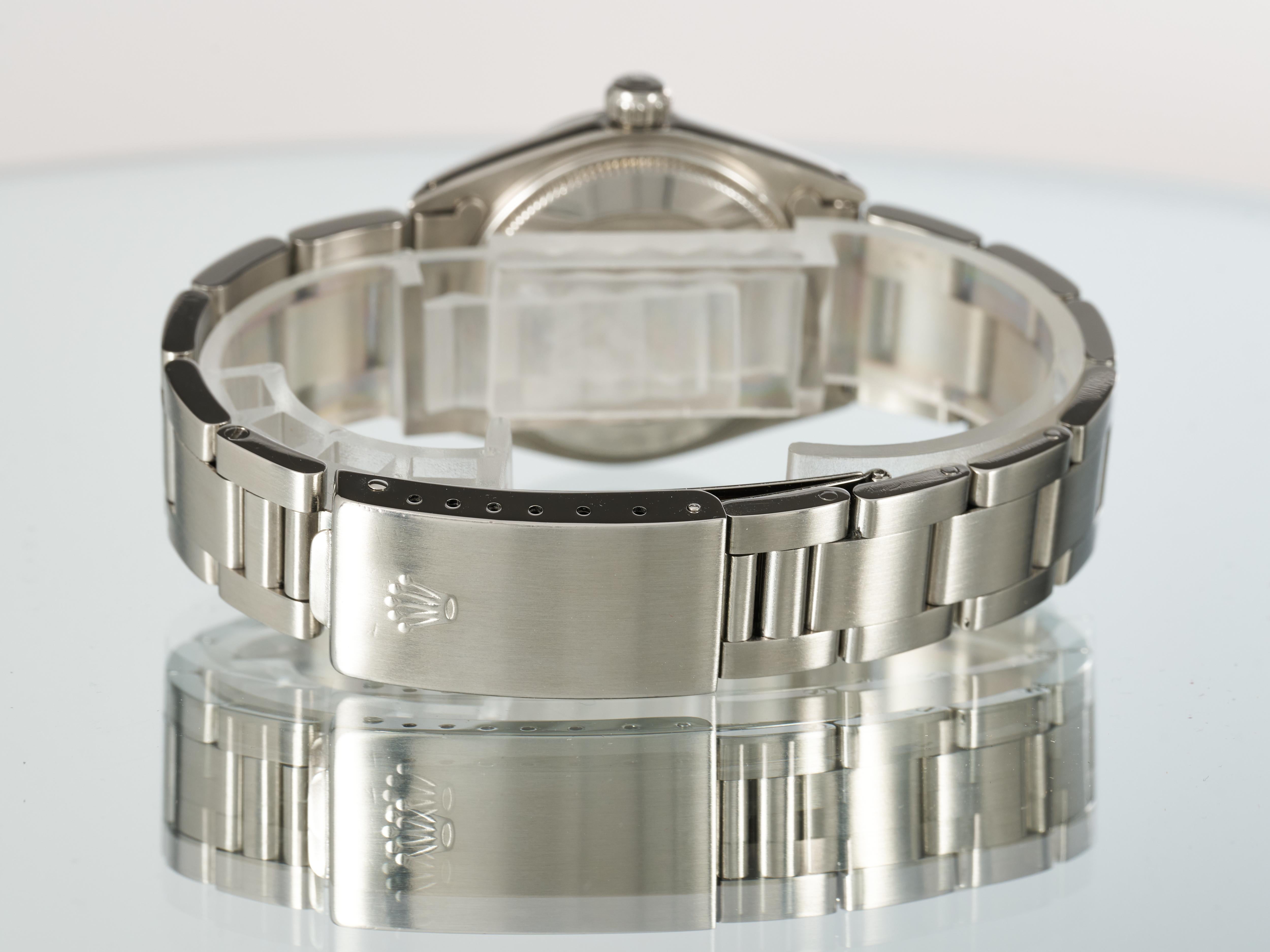 Rolex Montre Datejust 31 mm, cadran Sigma gris rhodié, lunette cannelée or, acier 1975 en vente 10