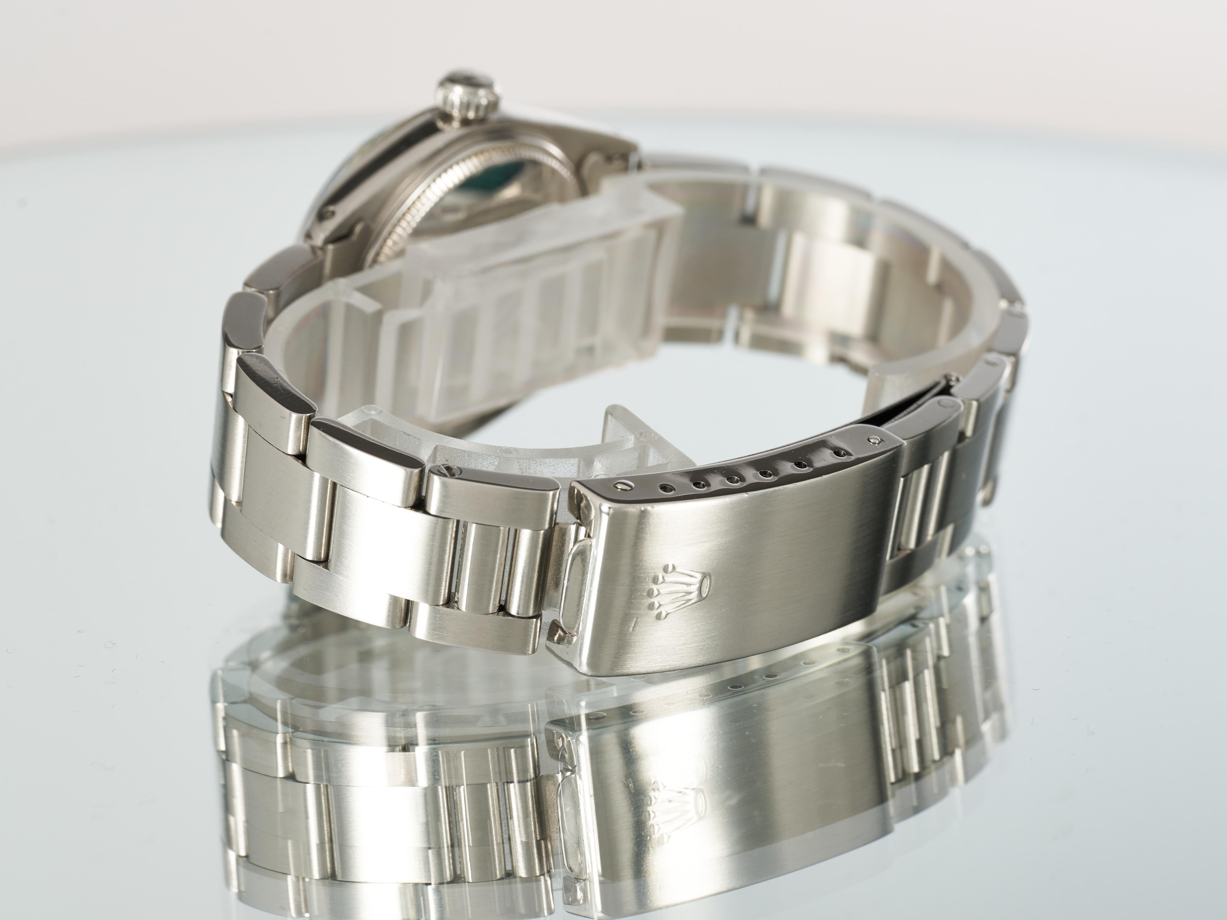 Rolex Montre Datejust 31 mm, cadran Sigma gris rhodié, lunette cannelée or, acier 1975 en vente 11
