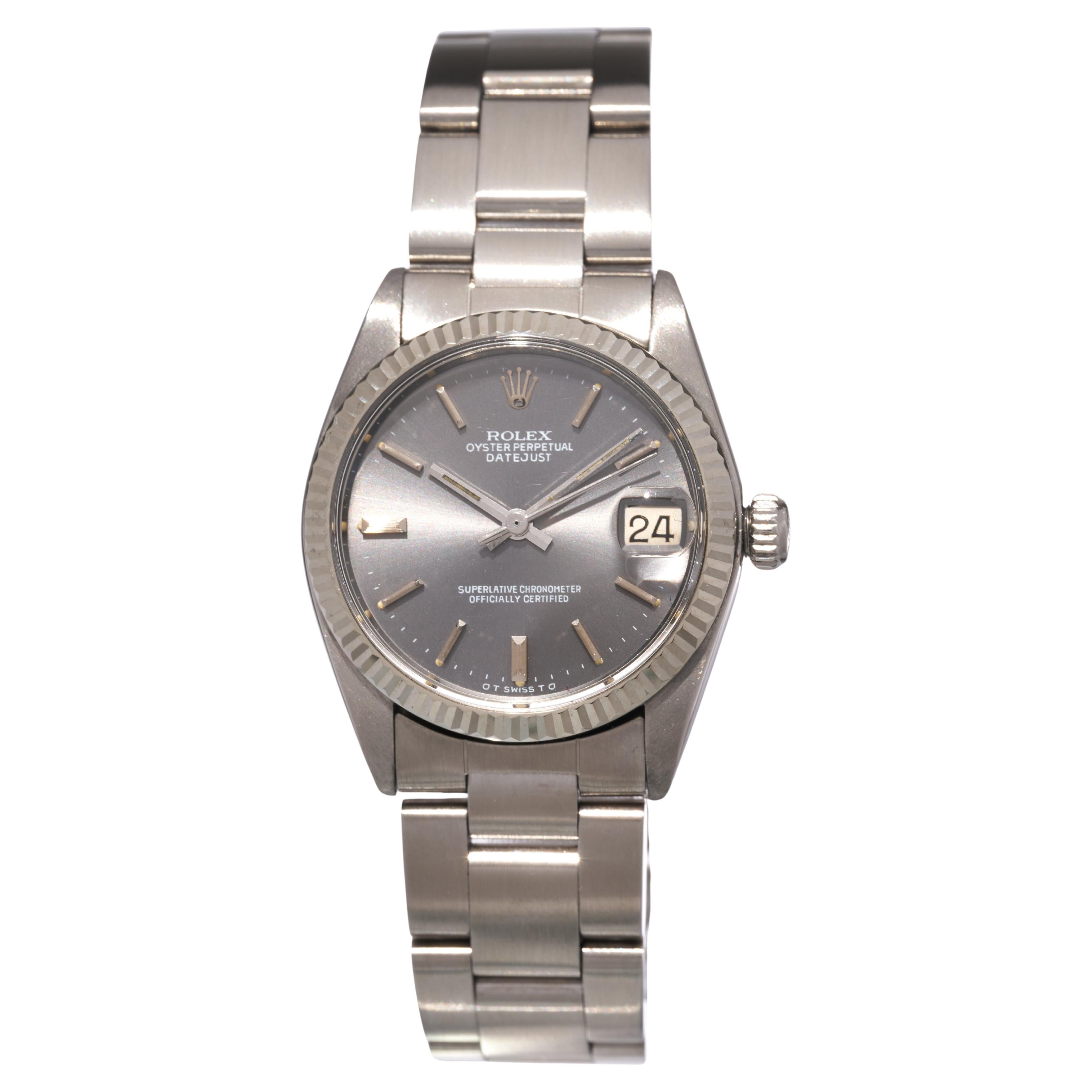 Rolex Montre Datejust 31 mm, cadran Sigma gris rhodié, lunette cannelée or, acier 1975 en vente